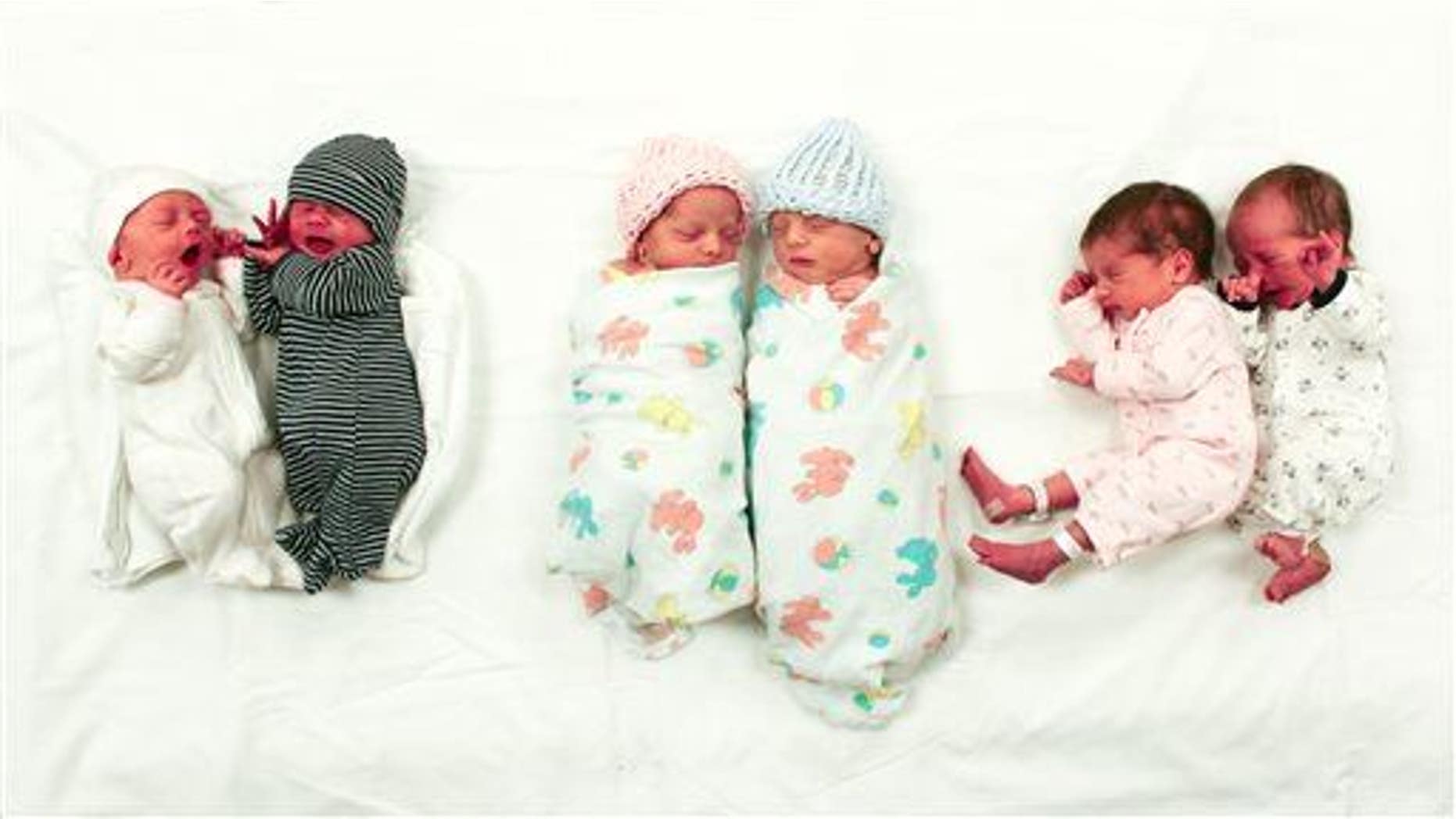 A July 23, 2015 photo provided by the Bozeman Deaconess Hospita shows three sets of twins that were born at Bozeman Deaconess Hospital during a seven-hour period on July 22. The babies, from left to right, are Sonja Ryann and Landon Lee Jackson; Lena Marie and Tate James Dykema and Piper Cynthia and Ethan Christopher Roberts. (Bozeman Deaconess Hospital via AP)