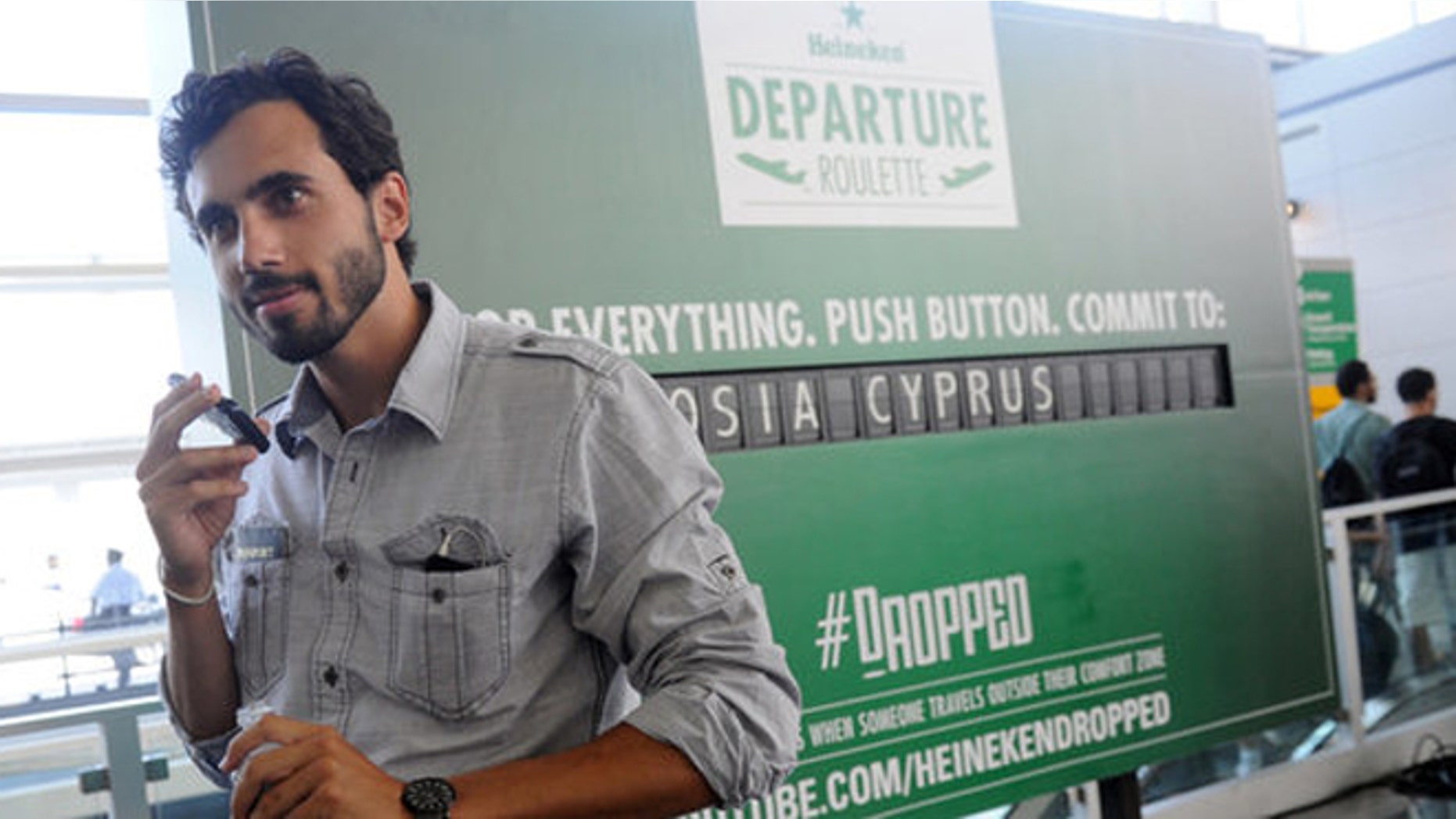 Greg Vosits, a student, delays his trip to visit grandparents in Austria after winning a trip to Cyprus from Heineken.