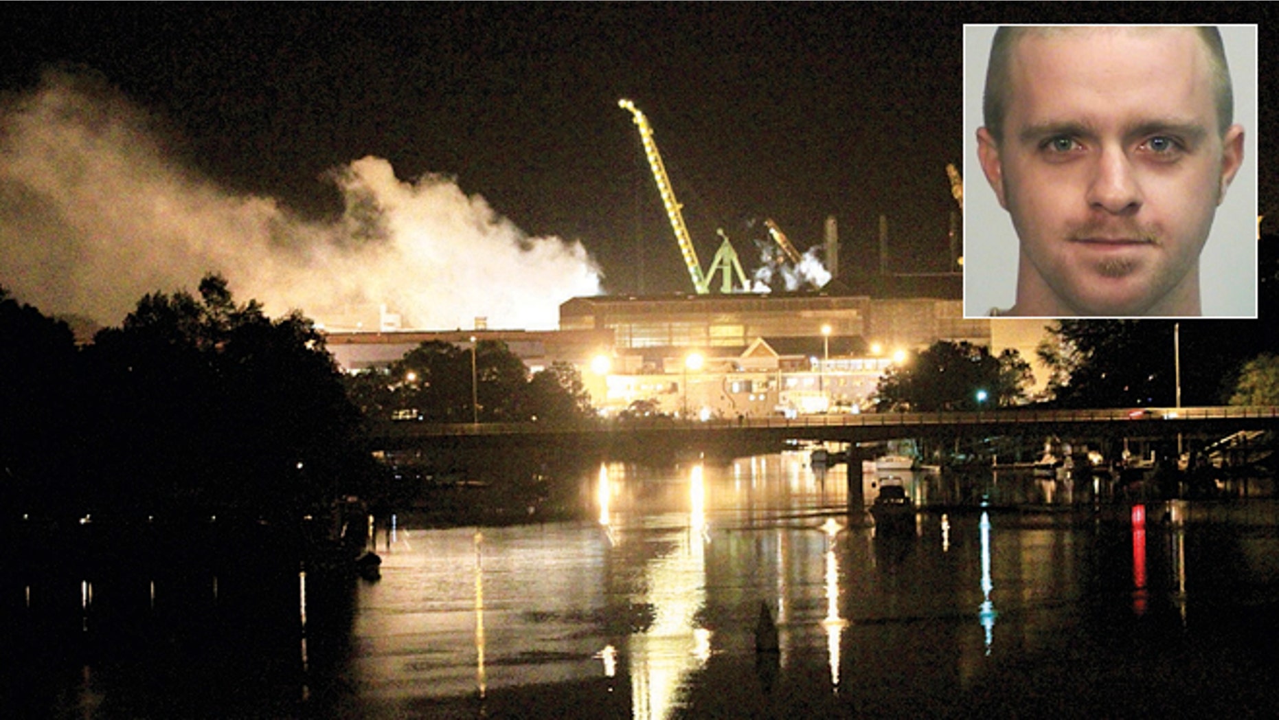 FILE: Smoke rises from a dry dock as fire crews respond to a fire on the USS Miami SSN 755 submarine at the Portsmouth Naval Shipyard. Casey James Fury waived indictment and pleaded guilty Thursday to two counts of arson.
