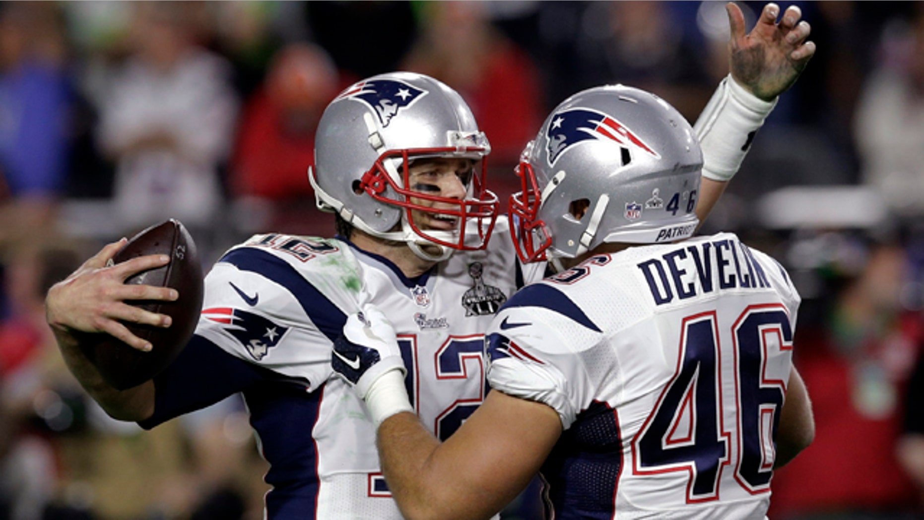 Feb. 1, 2015: New England Patriots quarterback Tom Brady (12) celebrates with New England Patriots fullback James Develin (46) after NFL Super Bowl XLIX football game against the Seattle Seahawks in Glendale, Ariz. (AP Photo/Patrick Semansky)