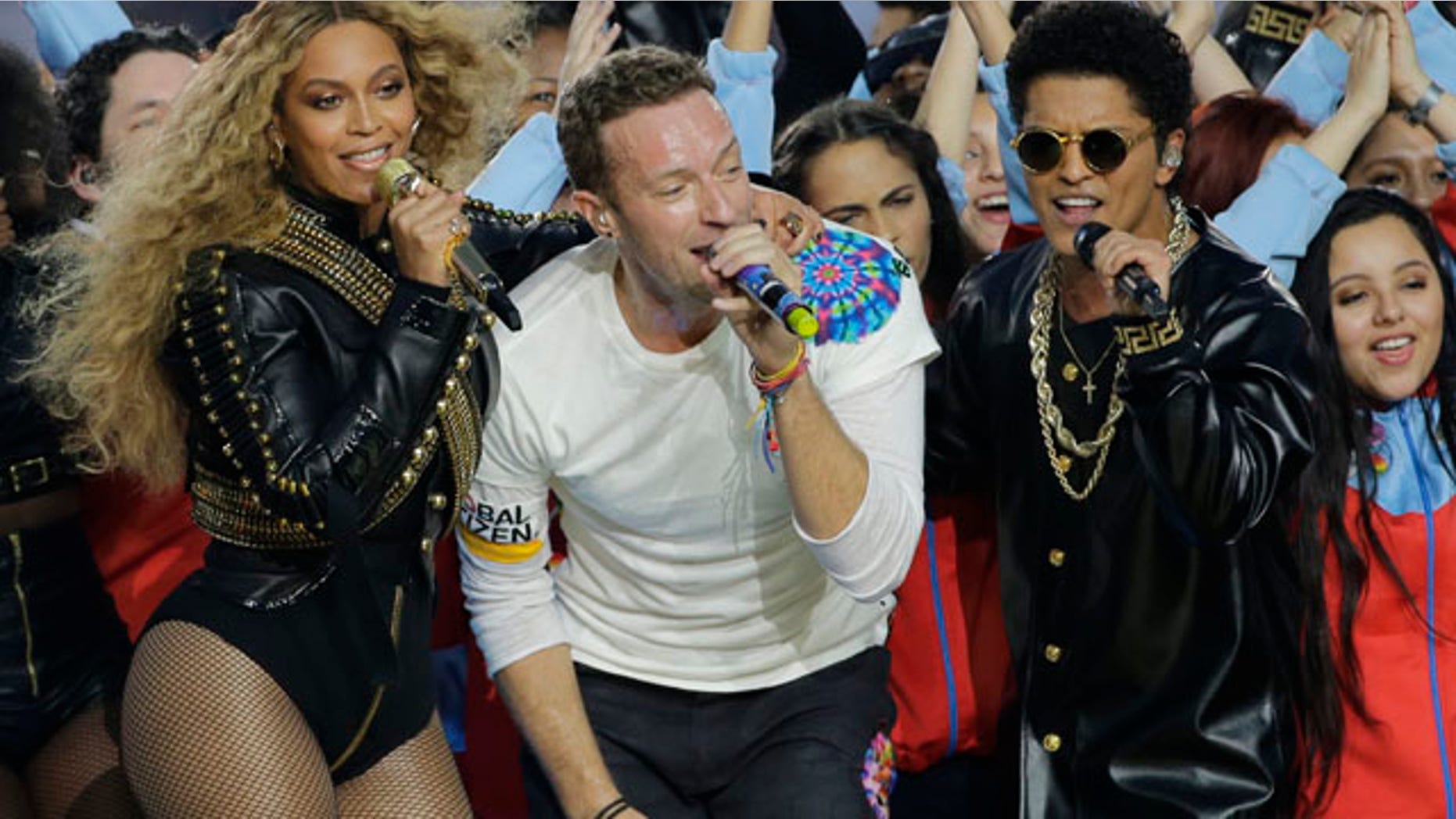 Feb. 7, 2016: Beyoncé, Coldplay singer Chris Martin and Bruno Mars perform during halftime of Super Bowl 50 in Santa Clara, Calif. (AP Photo/David J. Phillip)