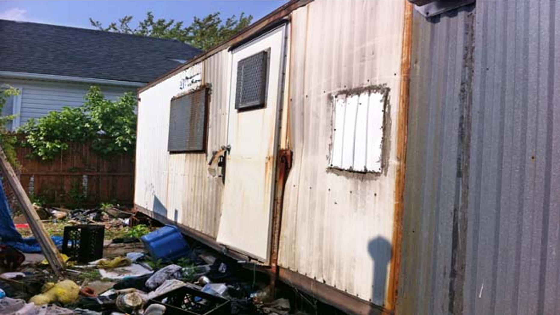 A dilapidated trailer sits parked in a trash strewn lot in Queens. Thought to be vacant, the trailer went unsearched after Superstorm Sandy flooded the area in late 2012. More than five months after the storm, the partially skeletonized remains of 62-year-old Keith Lancaster were found inside on April 5, 2013. He was among the 44 lives claimed by Sandy in New York City