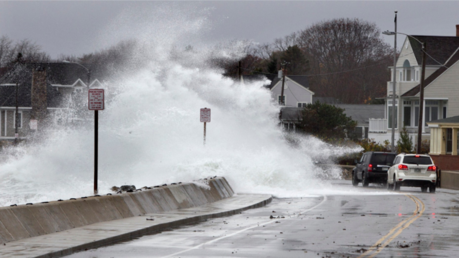 Oct. 29, 2012: Heavy surf crashes over a seawall on the Atlantic Ocean during the early stages of Hurricane Sandy in Kennebunk, Maine. But what caused the massivfe storm?