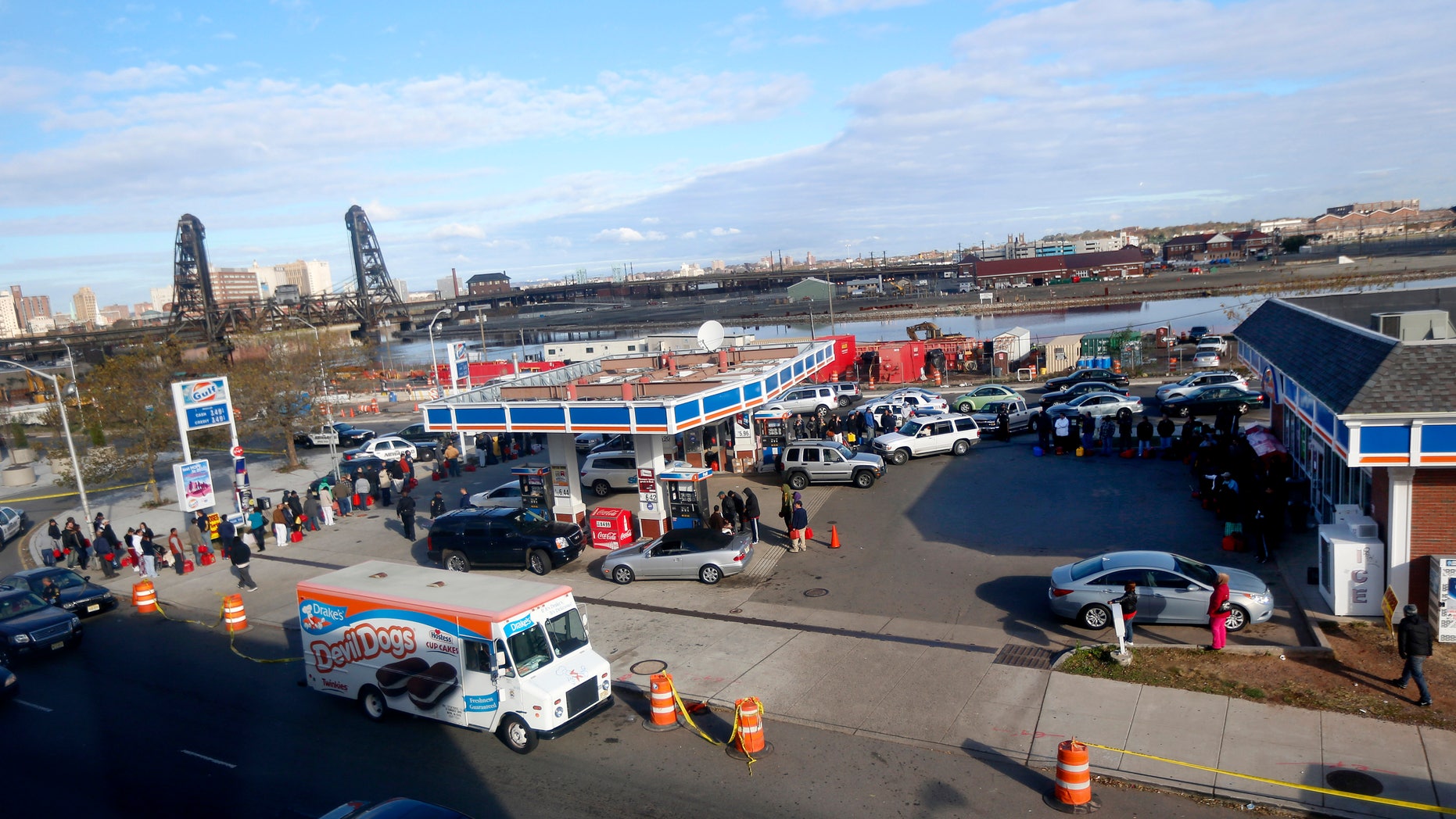 Nov. 2, 2012: People and vehicles line up at a gas station waiting to fill up in Newark, N.J.
