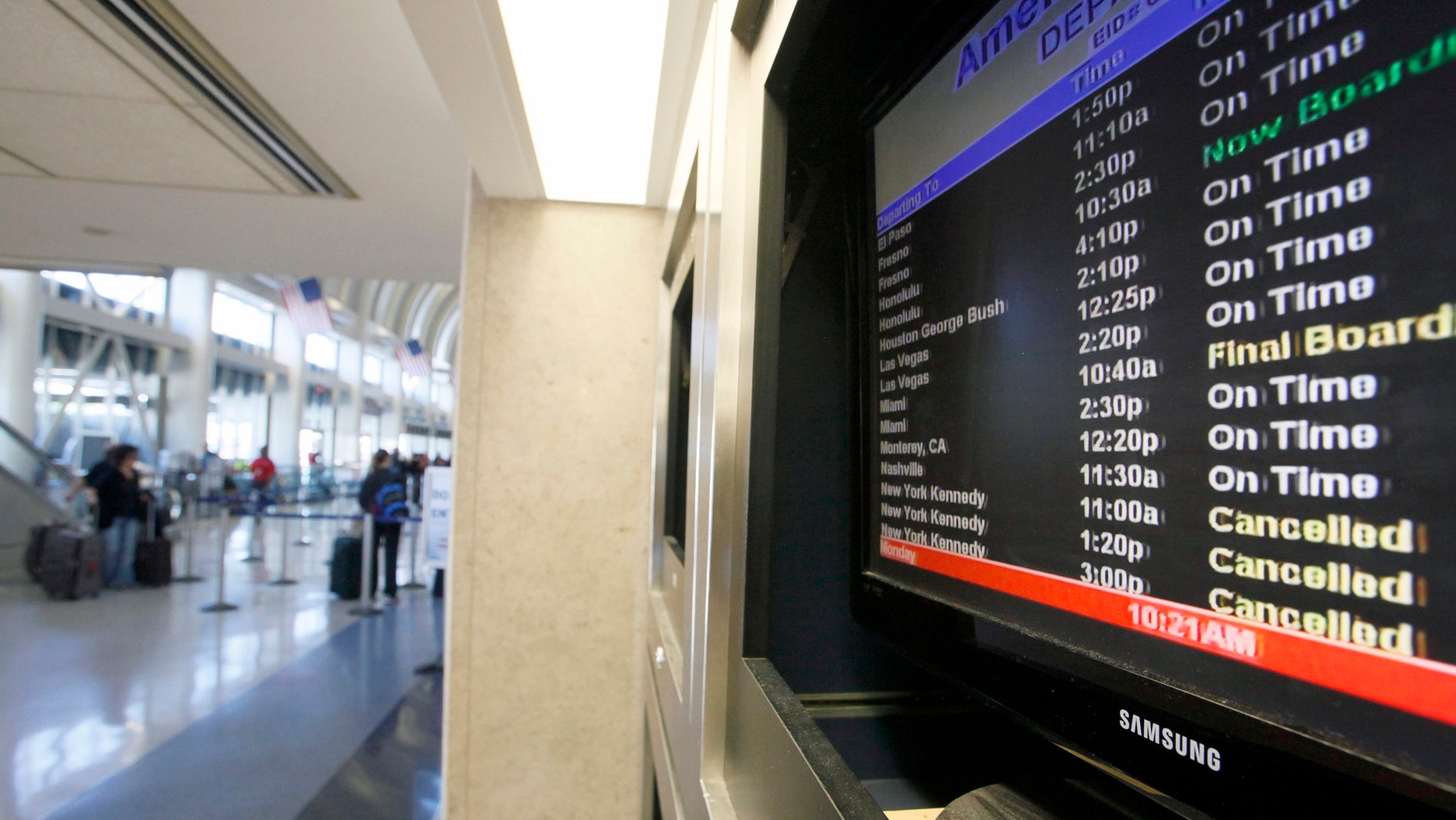 Oct 29, 2012 - File photo of display board with American Airlines canceled flights to New York.