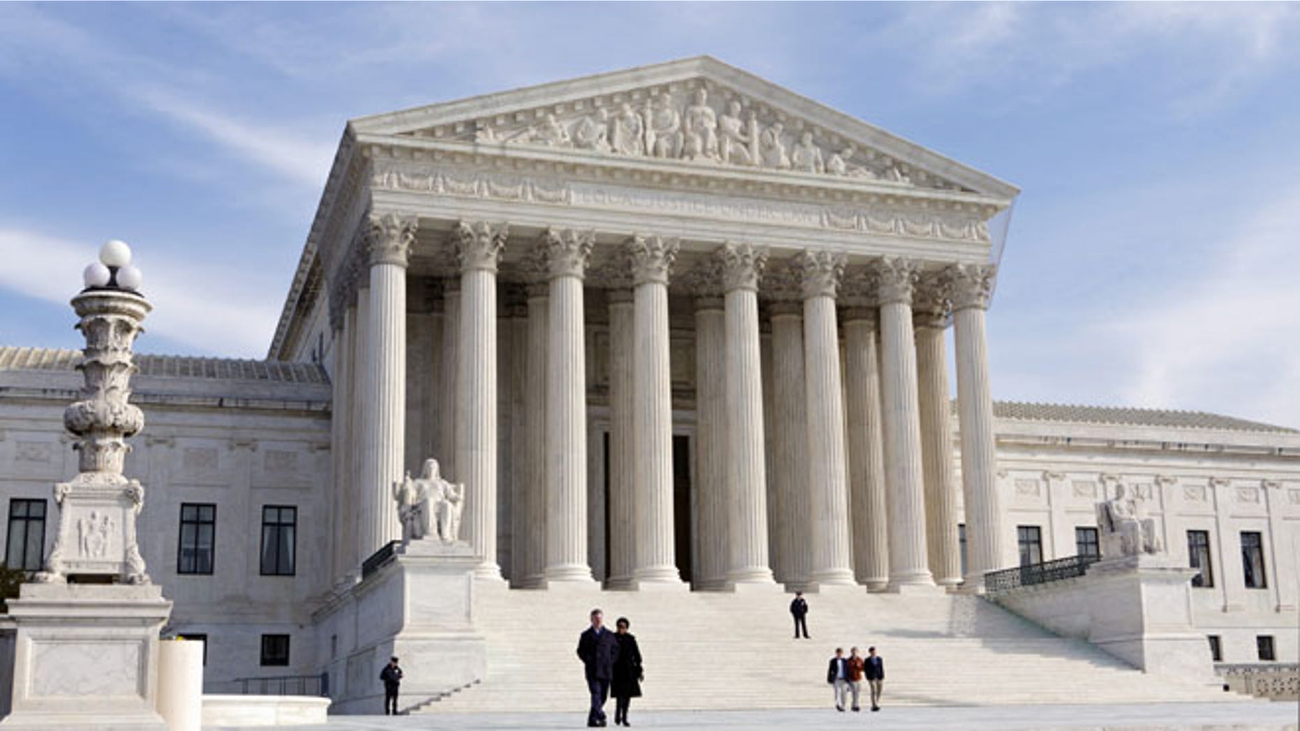 FILE - In this Jan. 25, 2012 file photo, the Supreme Court Building is seen in Washington. The Supreme Court has unanimously upheld a Texas law that counts everyone, not just eligible voters, in deciding how to draw electoral districts. (AP Photo/J. Scott Applewhite, File)