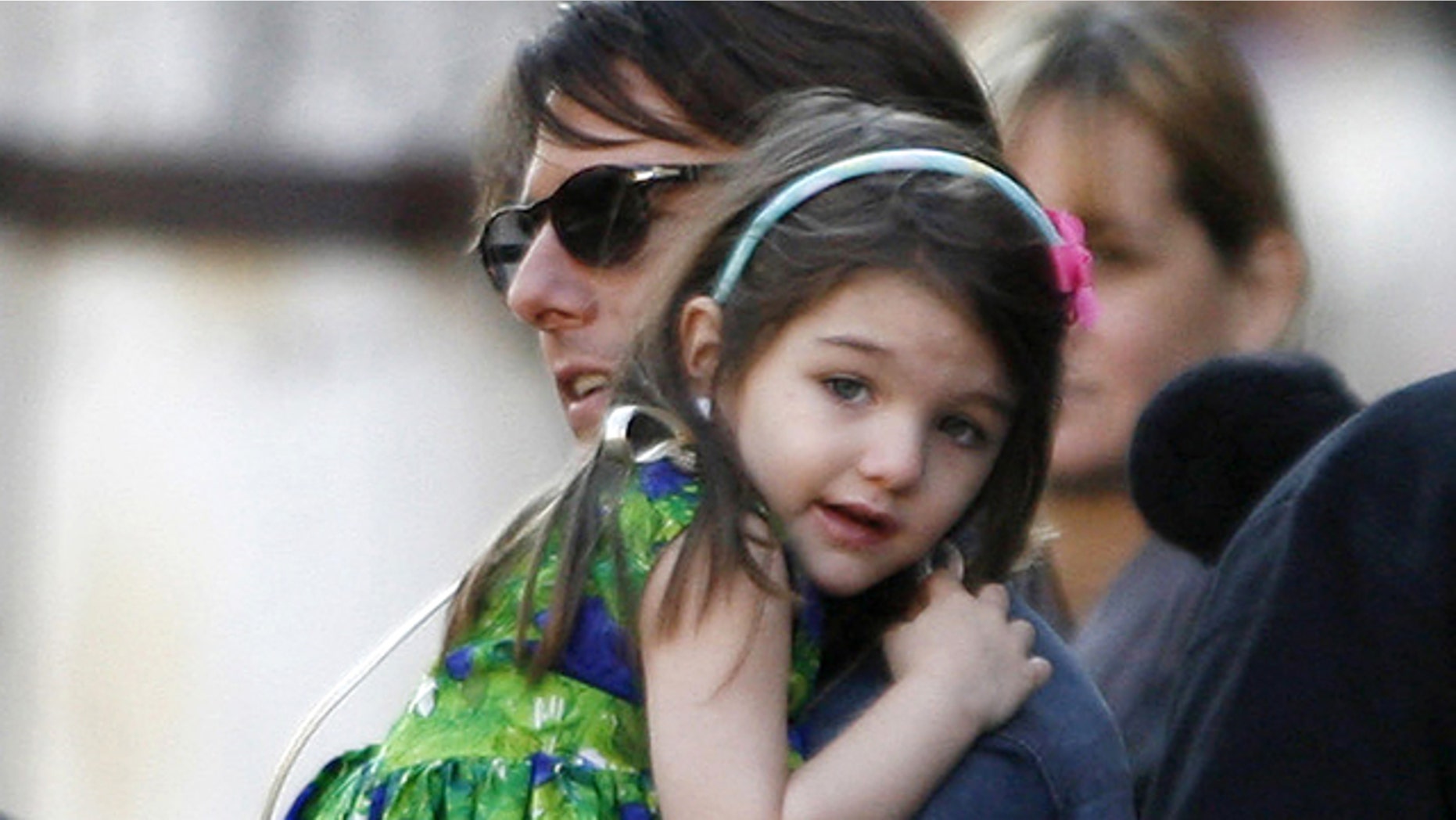 Tom Cruise holds his daughter Suri during a break in the filming of "Knight & Day", a movie directed by U.S. director James Mangold in Seville, southern Spain, December 11, 2009.