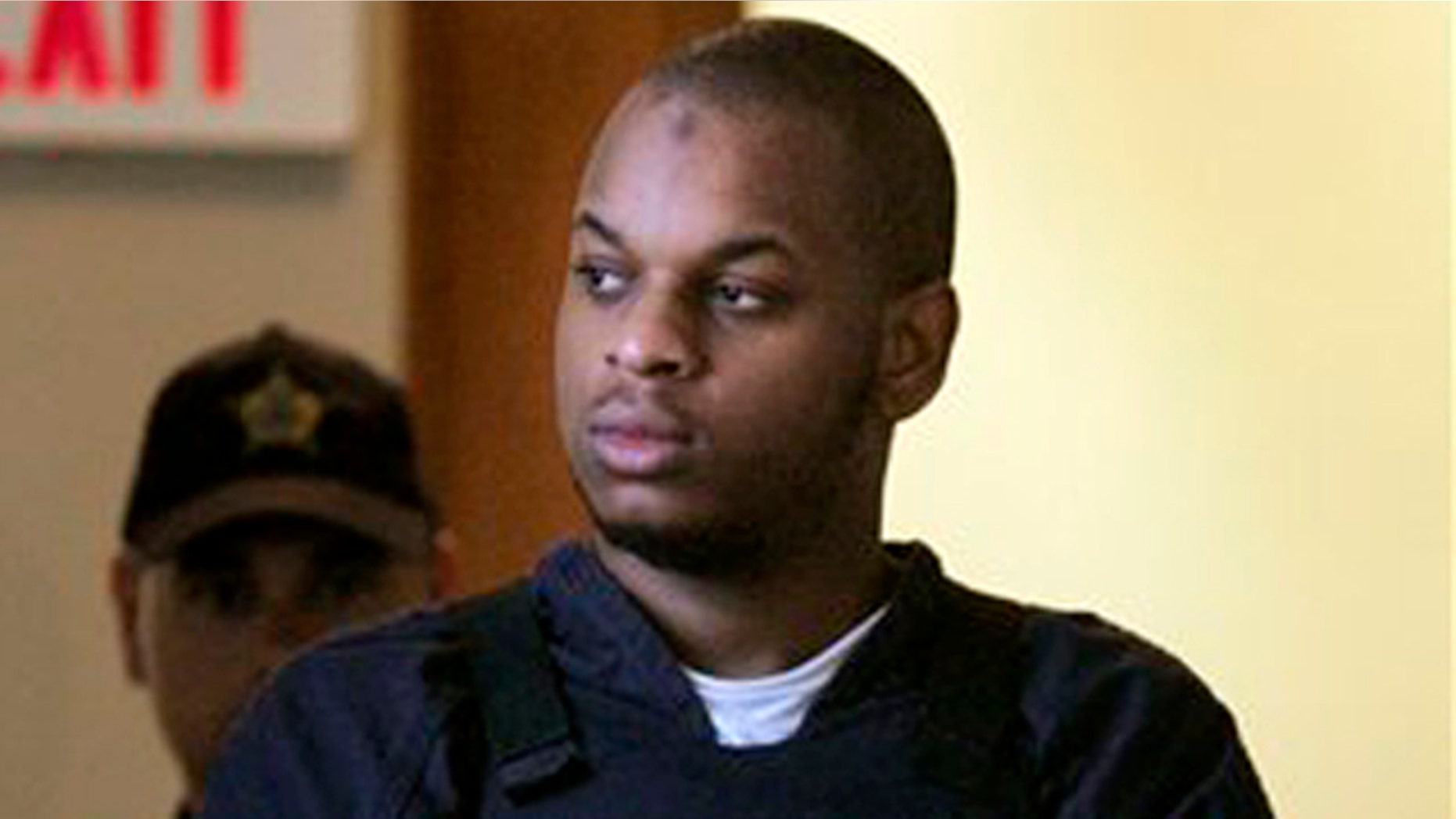 In this July 7, 2010 file photo, Abdulhakim Muhammad is escorted to a hearing at the Pulaski County Court House in Little Rock, Ark.