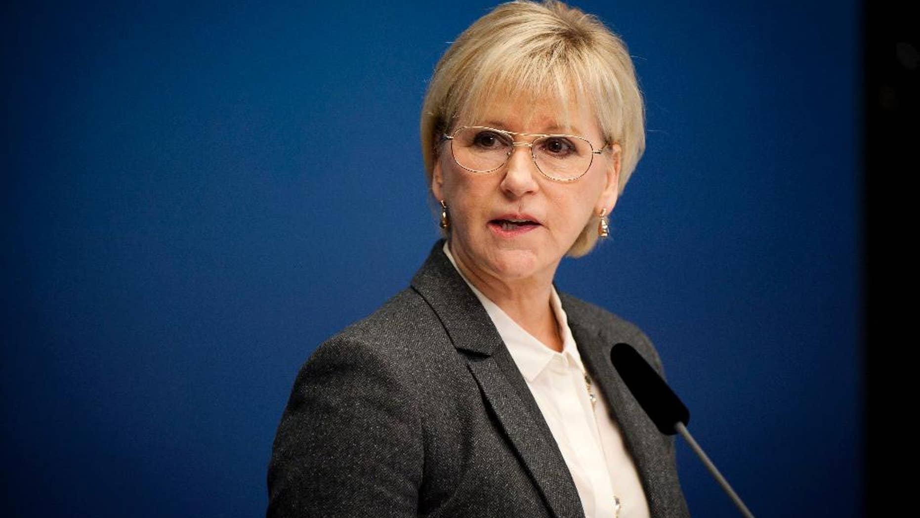 FILE - In this Thursday Oct. 30, 2014 file photo, Sweden's Foreign Minister Margot Wallstrom talks during a news conference at the government building Rosenbad, in Stockholm. Margot Wallstrom, who wants a bigger role for women in global peace and security affairs, said Friday Feb. 6, 2015, she will press Palestinian President Mahmoud Abbas to include women in efforts to build a viable Palestinian state on his visit to Sweden next week. (AP Photo/TT, Annika af Klercker) SWEDEN OUT