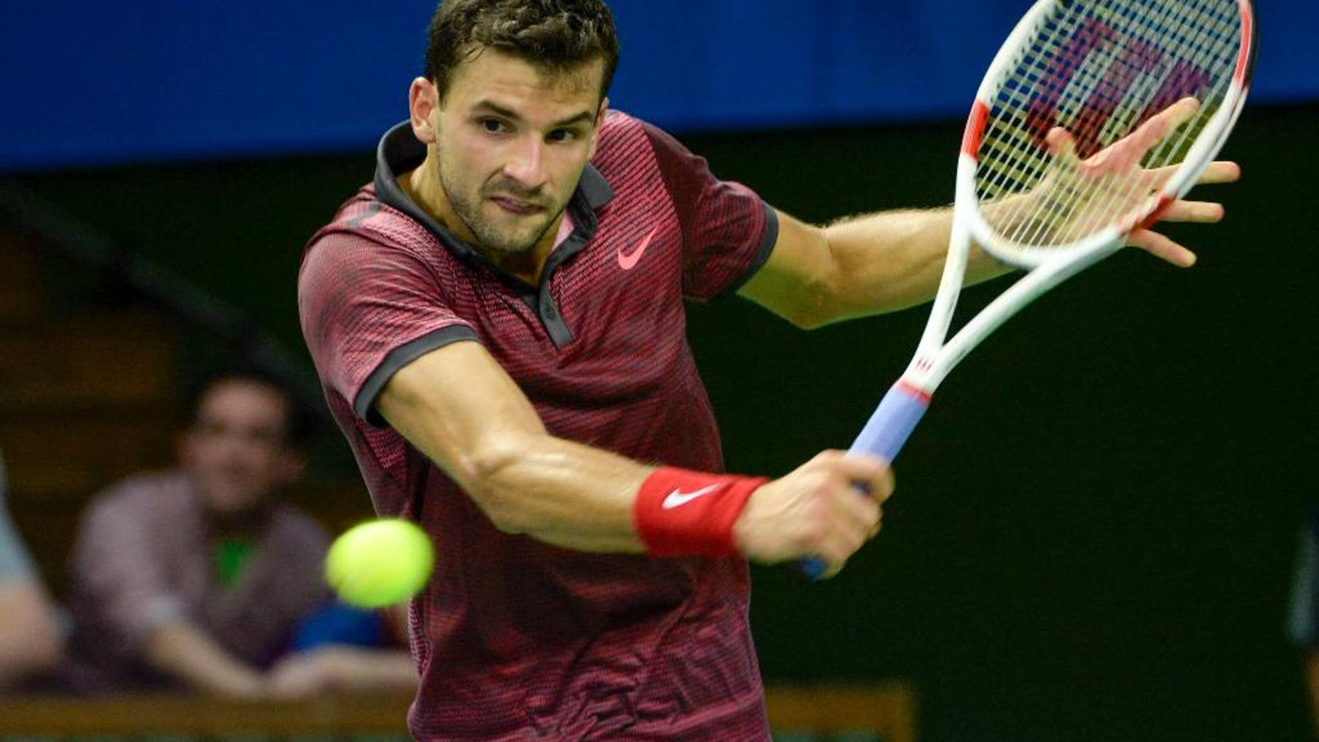 Grigor Dimitrov of Bulgaria returns a shot during the Stockholm Open men's tennis final against Tomas Berdych of the Czech Republic, Stockholm, Sunday Oct. 19, 2014. (AP Photo / Jonas Ekstromer) ** SWEDEN OUT **