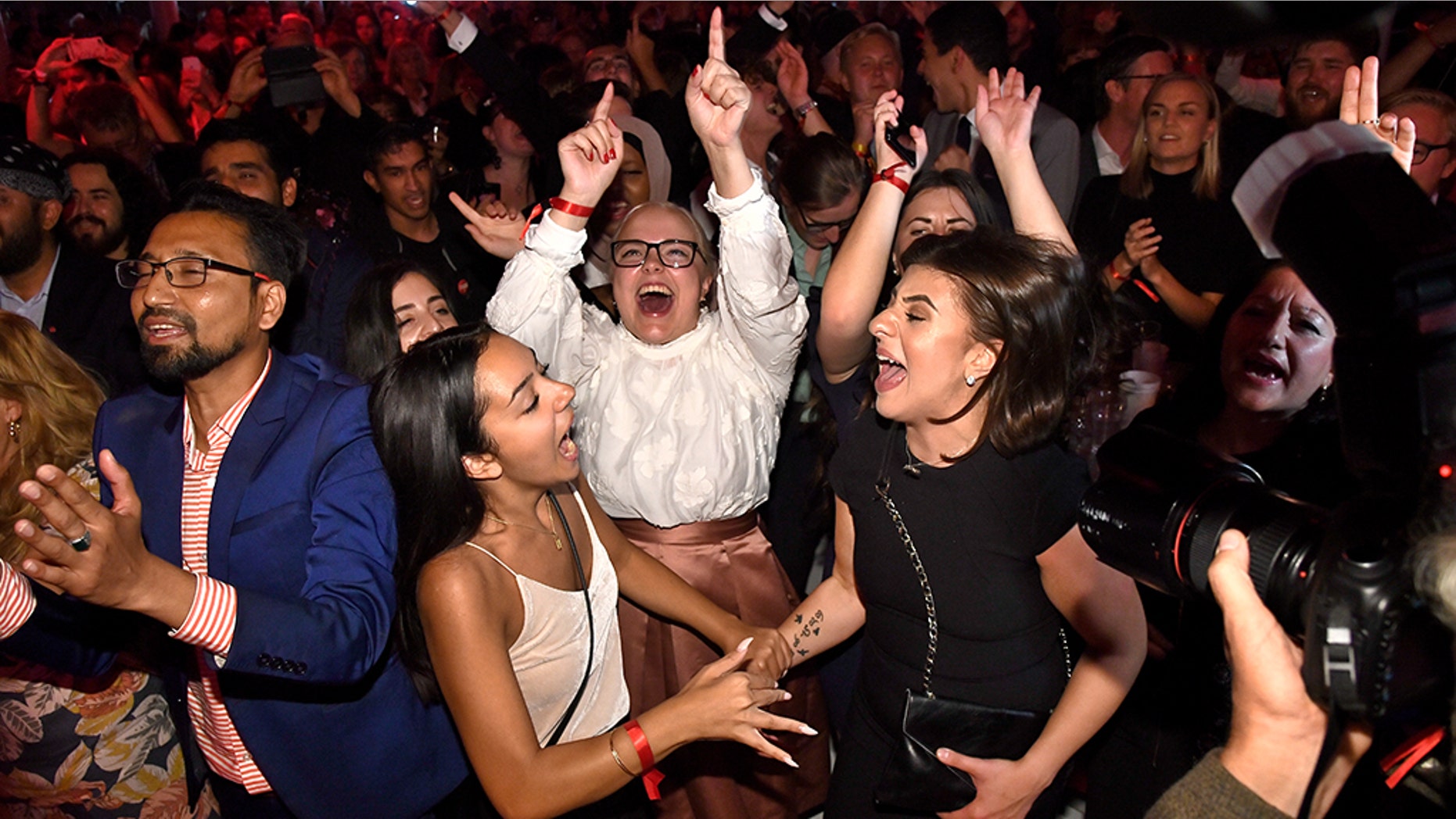 Supporters attend the Social Democratic Party’s election night party in Stockholm, Sweden, Sunday. A preliminary count from Sweden’s general election showed an anti-immigrant party with a neo-Nazi past placing third and the ruling center-right party making its worst showing in decades with more than half of the ballots tallied.