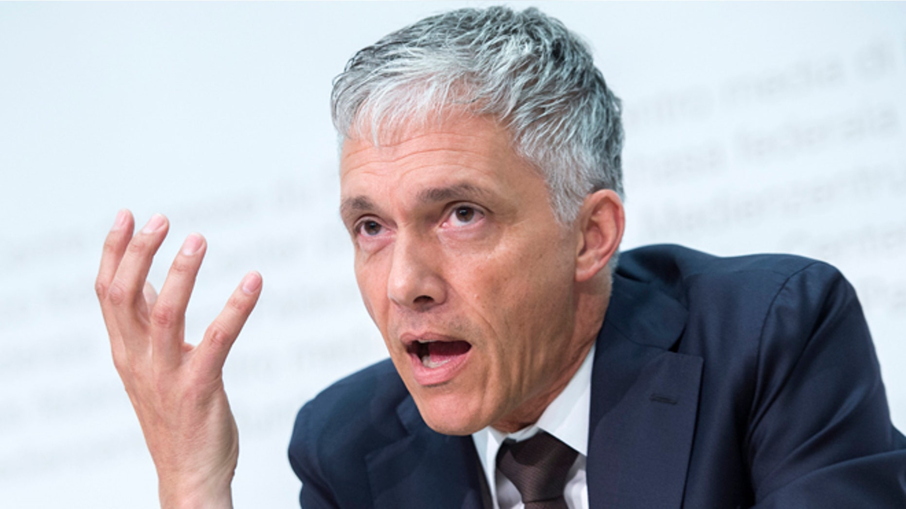 Swiss attorney general Michael Lauber speaks during a press conference in Bern, Switzerland, Wednesday, June 17, 2015. Lauber said that banks have noted 53 possible money-laundering cases in a FIFA probe. (Marcel Bieri/Keystone via AP)