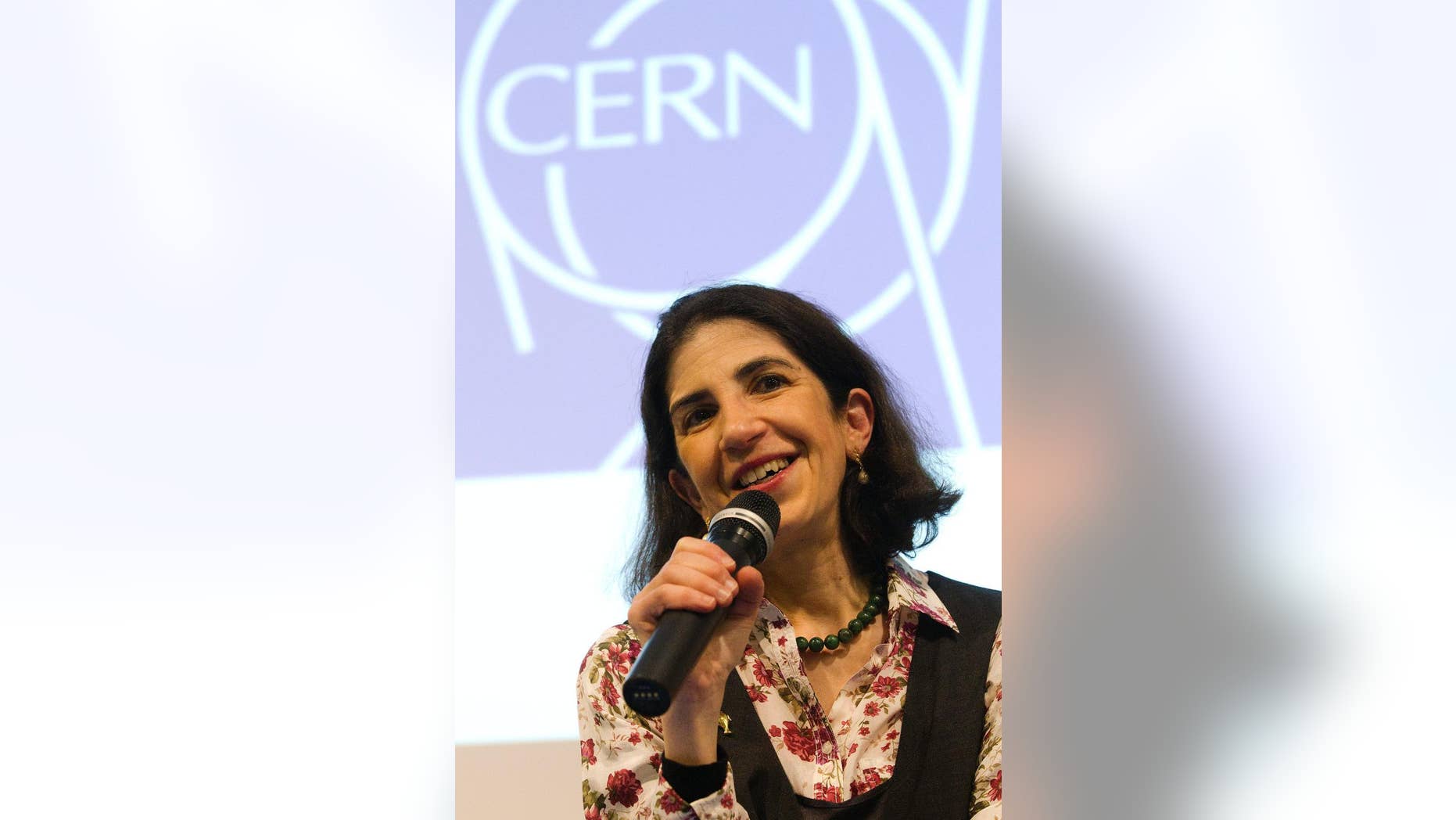 FILE - The Dec. 13, 2011 file photo shows Professor Fabiola Gianotti as she informs to media about the Higgs search during a press conference at the European Particle Physics laboratory (CERN), in Geneva, Switzerland. Italian physicist has been selected by the CERN council on Tuesday, Nov. 4, 2014 as the Organization’s next Director-General. (AP Photo/Keystone, Salvatore Di Nolfi, file)