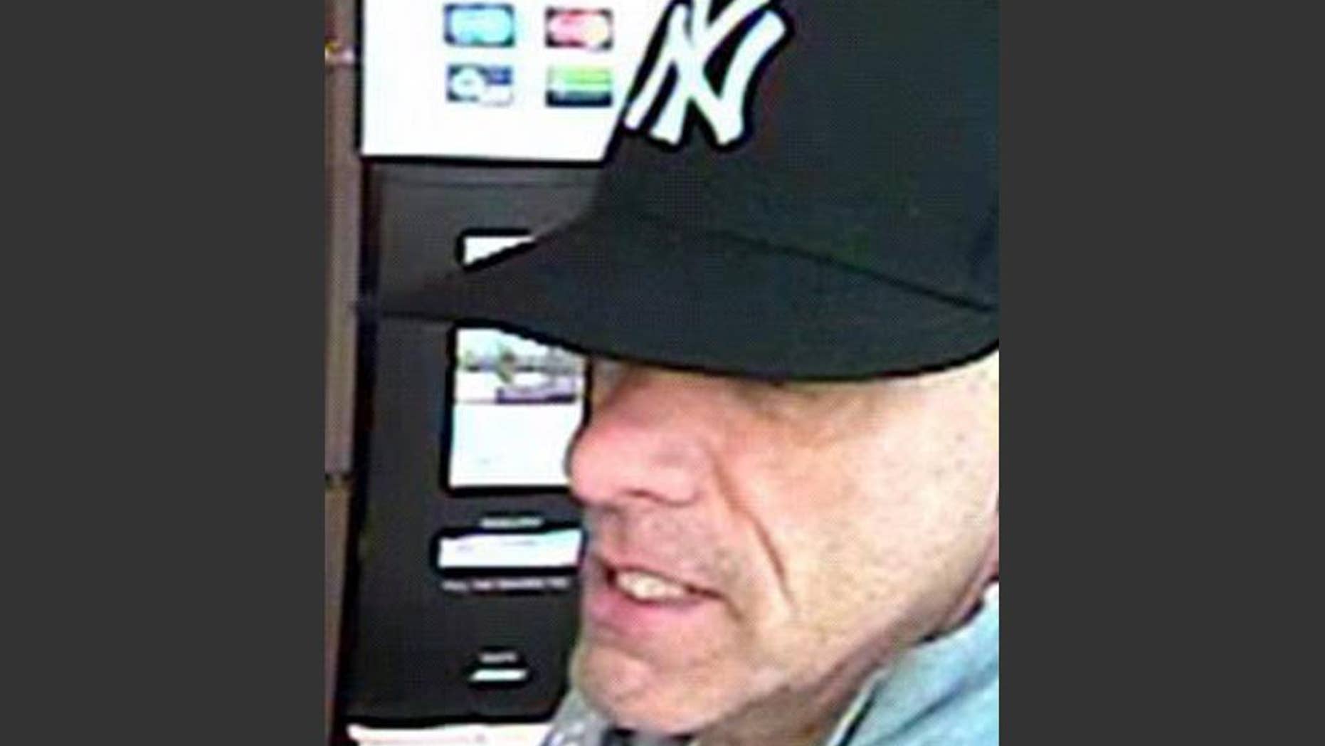 This undated surveillance photo provided by the York Regional Police shows a bank robbery suspect, not identified by name, but nicknamed "The Vaulter Bandit." On Tuesday, Sept. 15, 2015, Geneva police arrested the suspect, who had been sought under an international arrest warrant issued by Canada in connection with 22 bank robberies over the last five years. (Courtesy of York Regional Police/The Canadian Press via AP)