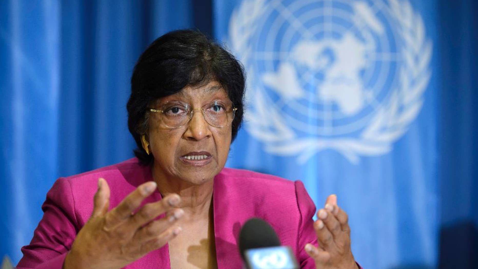 July 31, 2014: UN High Commissioner for Human Rights, South African Navi Pillay, answers journalist's questions about the human rights situation in the world, during a press conference at the Geneva Press Club, in Geneva, Switzerland.