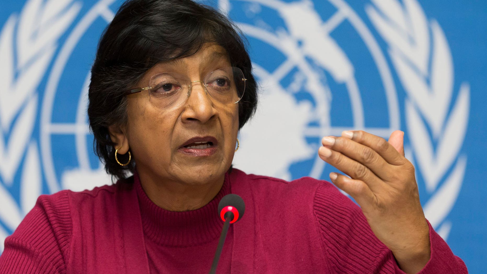 Dec. 2, 2013 - UN High Commissioner for Human Rights, South African Navi Pillay speaks at a news conference at the European UN headquarters in Geneva, Switzerland. Pillay says there is mounting evidence that Syrian government officials including President Bashar Assad are responsible for crimes against humanity.