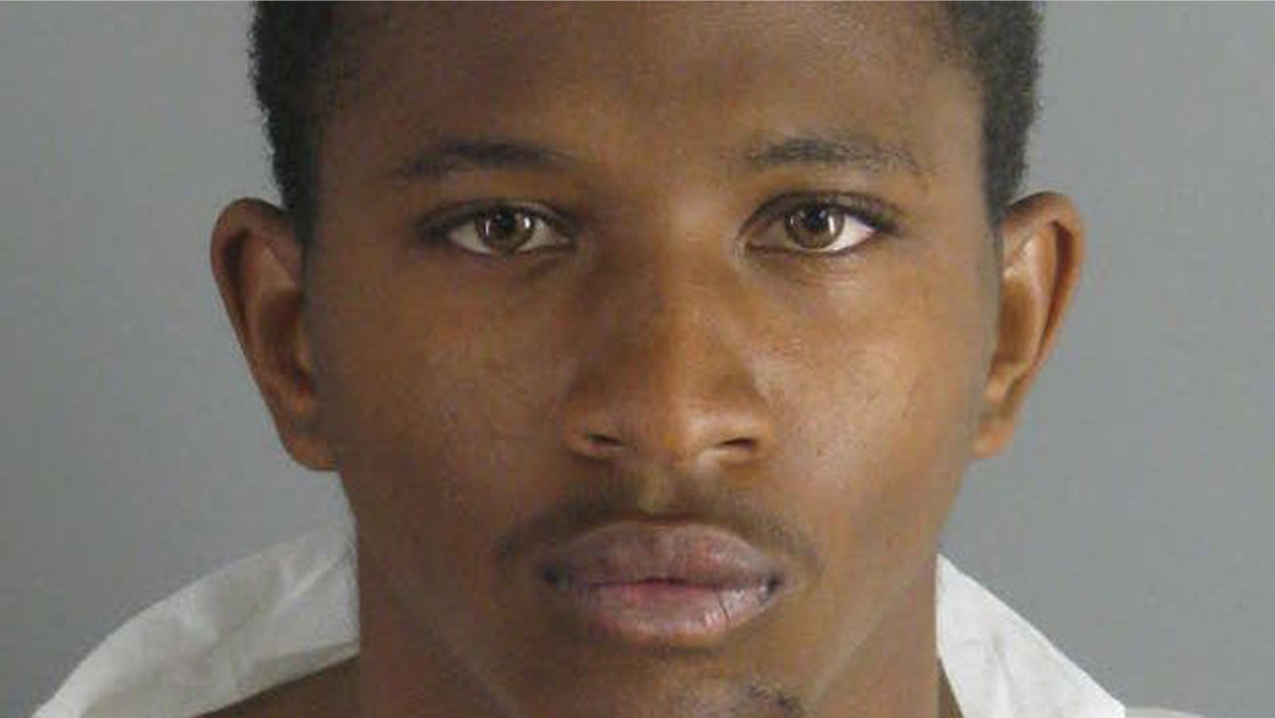 Booking photo for 19-year-old Michael Sykes.