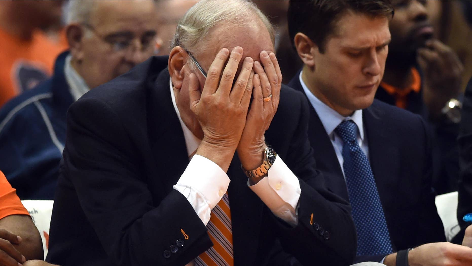 Nov. 25, 2014: Syracuse head coach Jim Boeheim buries his head in his hands after Rakeem Christmas is called for a foul against Loyola during the second half of an NCAA college basketball game