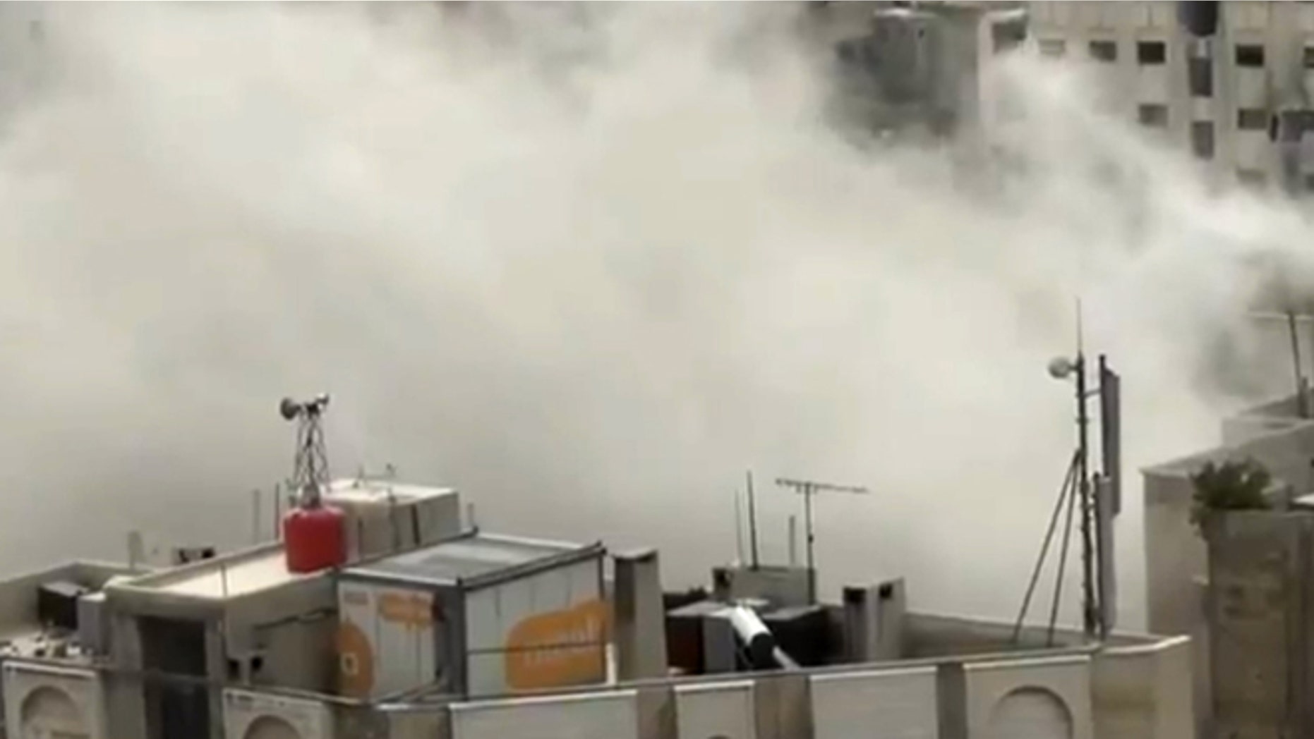 April 2, 2013: In this image taken from video obtained from Shaam News Network, which has been authenticated based on its contents and other AP reporting, shows smoke from heavy shelling in the Jobar neighborhood in north Damascus, Syria.