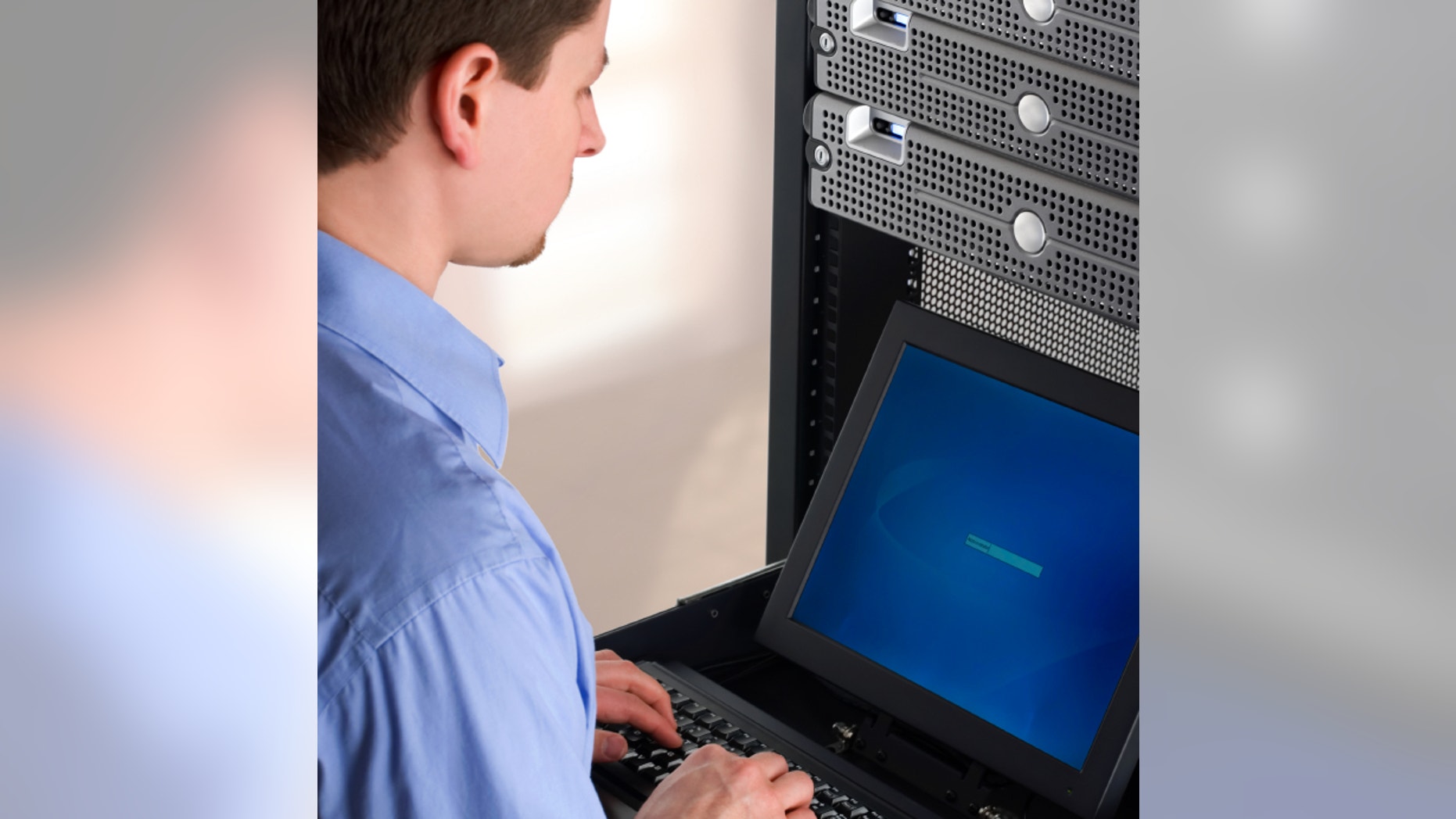 Young IT Professional Managing Network Servers.