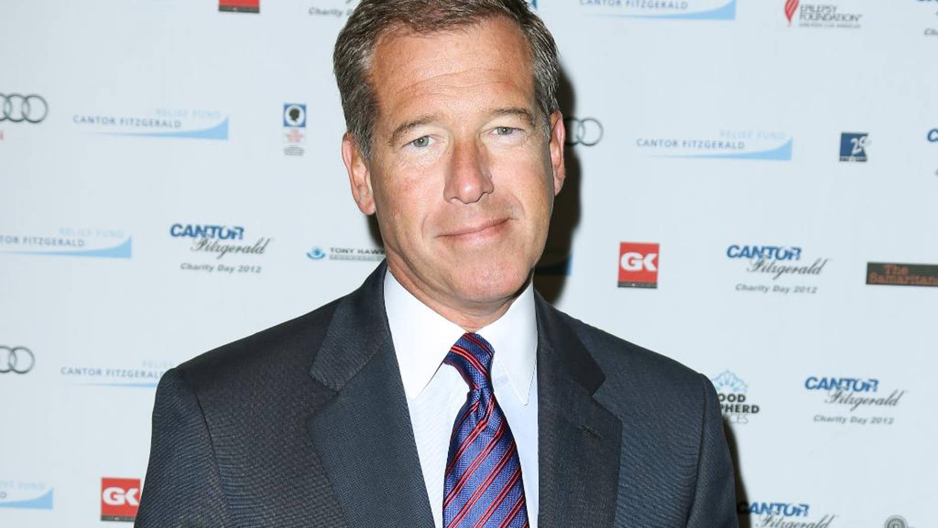 FILE - This Sept. 11, 2012 file image released by Starpix shows Brian Williams at the Cantor Fitzgerald Charity Day event in New York. Williams anchors "NBC Nightly News with Brian Williams," on NBC. (AP Photo/Starpix, Andrew Toth)