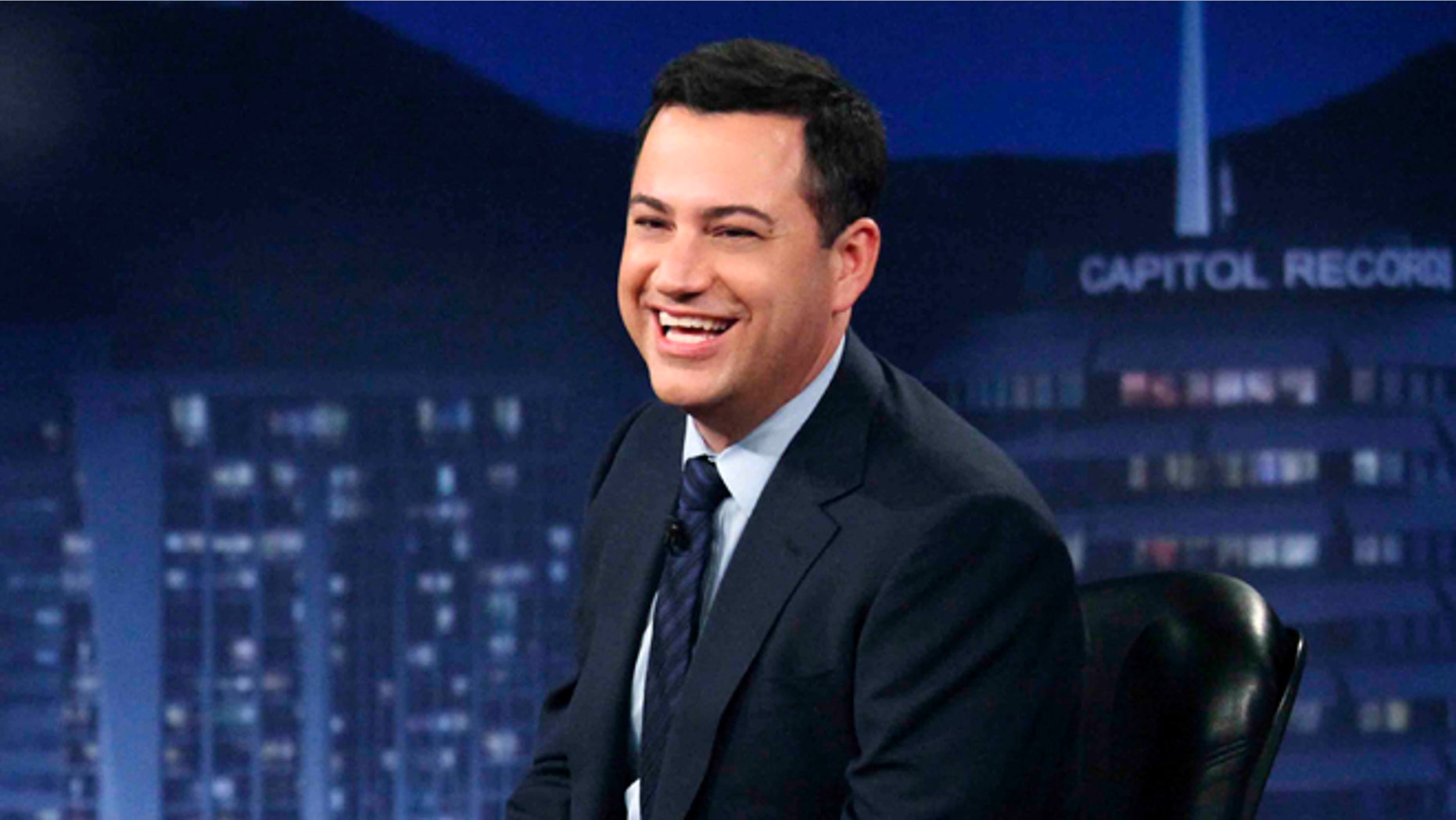 This July 25, 2012 photo released by ABC shows Jimmy Kimmel hosting his late night show "Jimmy Kimmel Live," in the Hollywood section of Los Angeles.