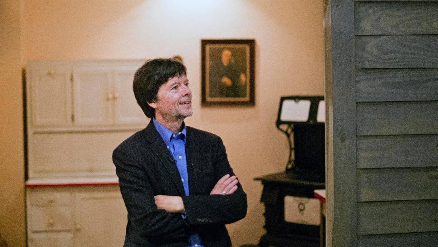 FILE - In this Nov. 2, 2013 file photo, documentary filmmaker Ken Burns walks through the museum at the Georgia home used by former President Franklin D. Roosevelt in Warm Springs, Ga. FDR, first lady Eleanor Roosevelt and another Roosevelt who occupied the White House as president, Theodore Roosevelt, are the subjects of a new Burns documentary for public television, “The Roosevelts: An Intimate History.” PBS said the seven, two-hour episodes that aired last month had an average audience of 9.2 million viewers. The most popular was the first night, on Sept. 14, which had 11.7 million viewers, according to the Nielsen company. (AP Photo/David Goldman, File)