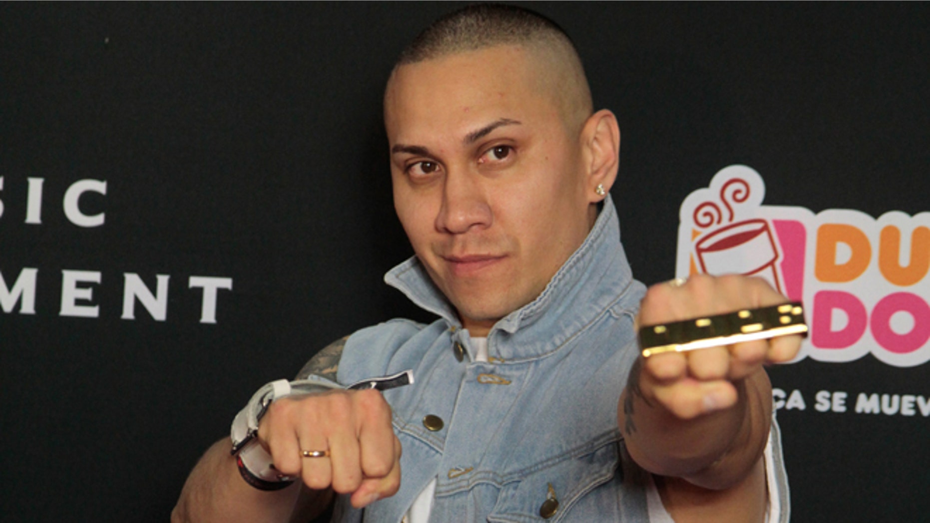 FILE - In this April 25, 2013 file photo, Taboo of the Black Eyed Peas arrives to the Universal Music Latin Entertainment Billboard after party in Miami, FL. (Poto by Marianela Sanchez/Invision for SodaStream/AP Images, File)