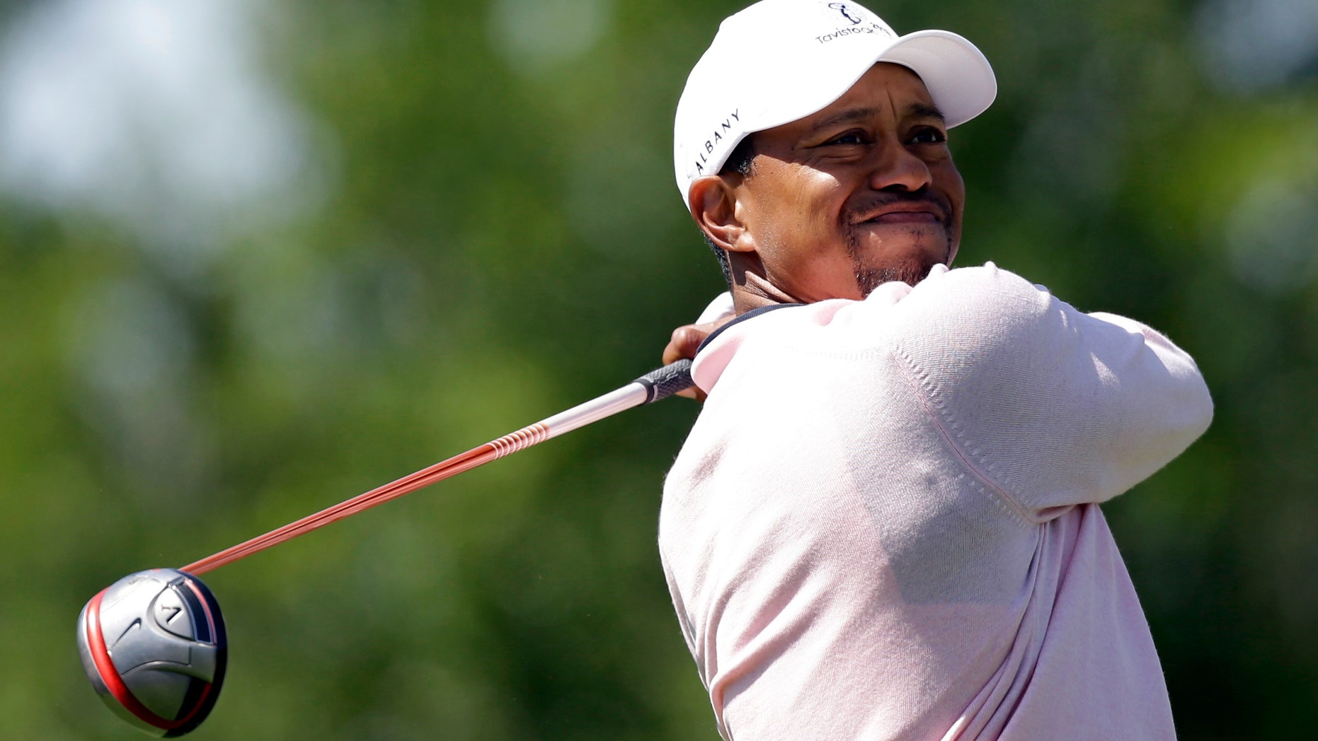 March 26, 2013: Tiger Woods hits from the fourth tee during the Tavistock Cup golf tournament in Florida.