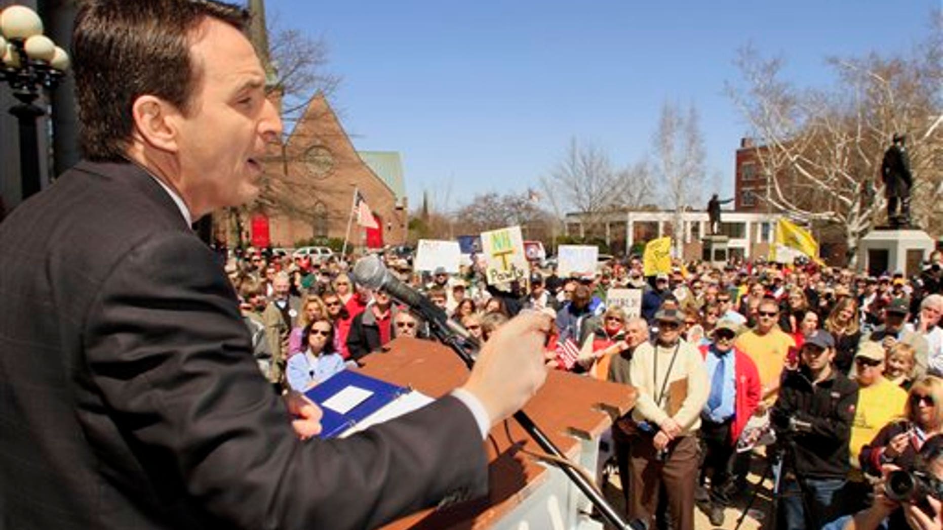 April 15: Former Minnesota Gov. Tim Pawlenty speaks to a crowd at a Tea Party rally at the Statehouse, in Concord, N.H. (AP)
