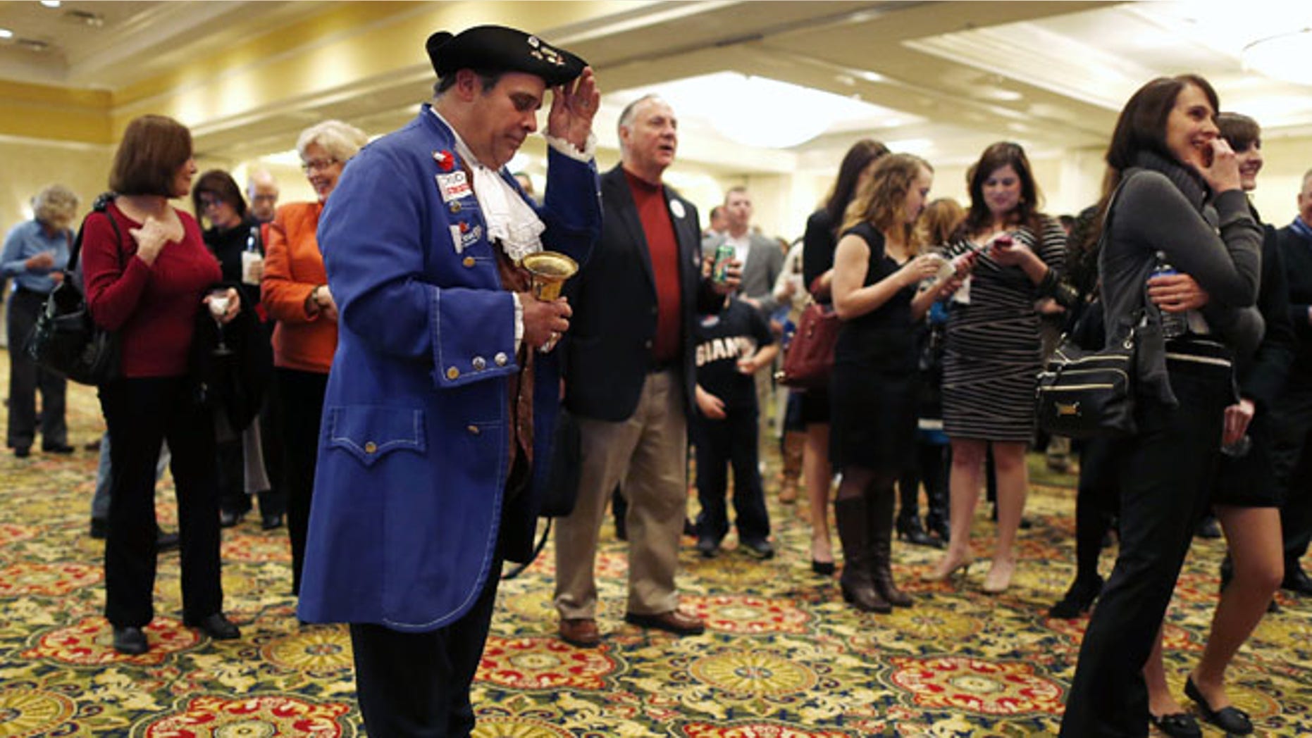 FILE: Nov. 5, 2013: A Tea Party member at a GOP event in Richmond, Va.