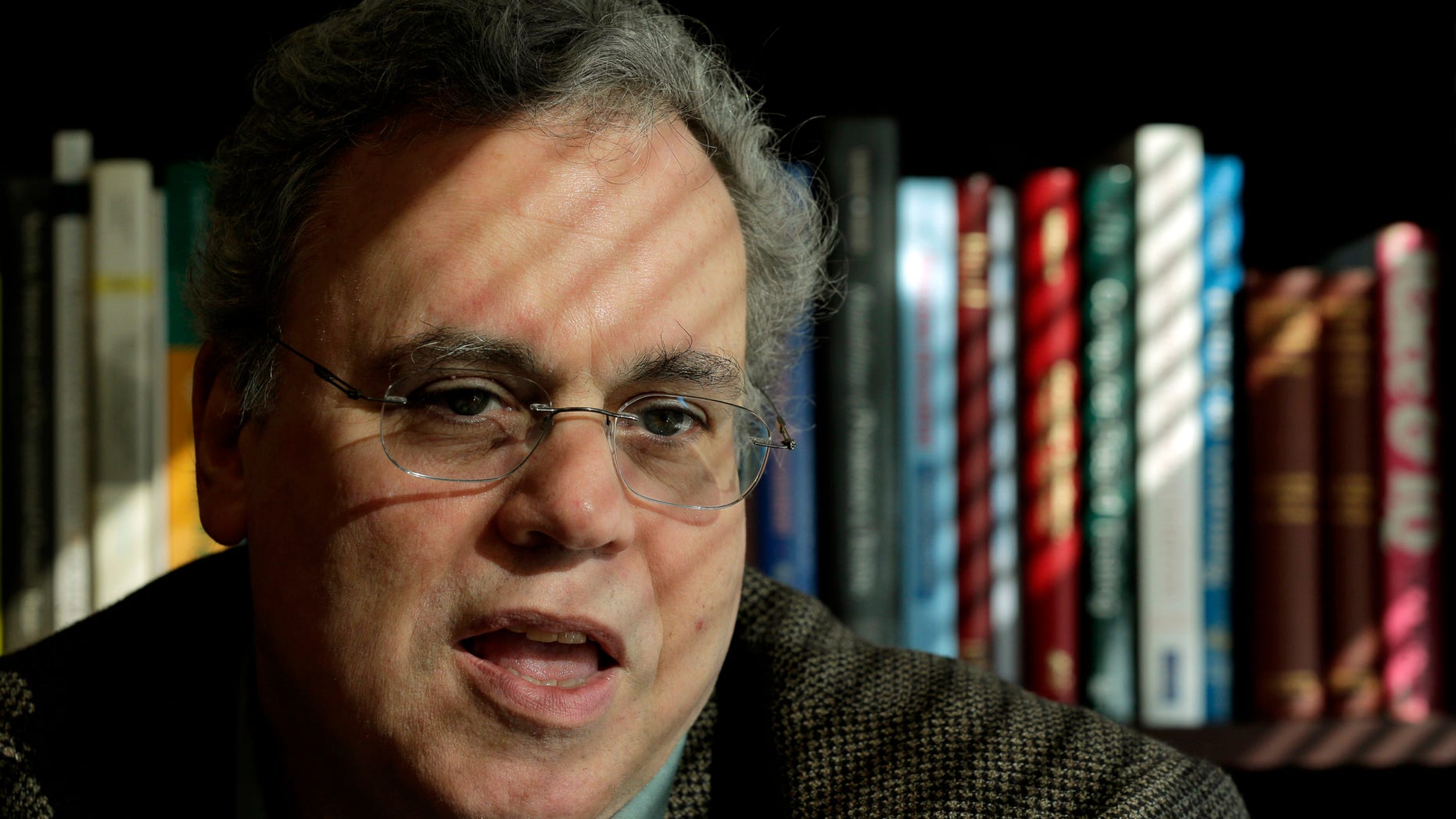In this photo taken Friday, Nov. 23, 2012, Neal Kingston, director of the Center for Educational Testing and Evaluation at the University of Kansas, talks about testing fraud in his Lawrence, Kan., office. Theres a never-ending war between those who try to maintain standards and those who are looking out for their own interests," says Kingston. (AP Photo/Charlie Riedel)