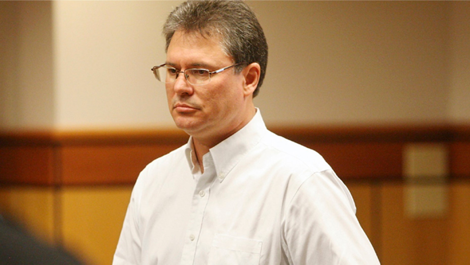 Stacey Rambold standing in a courtroom after sentencing by Judge G. Todd Baugh in Billings, Mont., on Aug. 26, 2013.