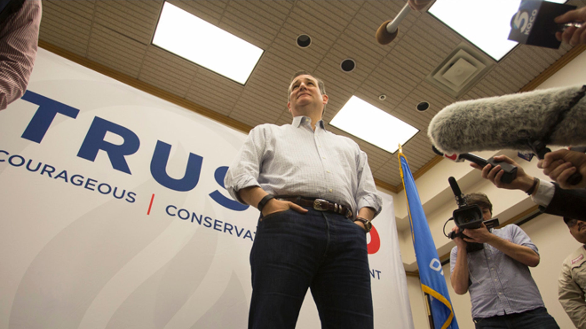FILE - In this Dec. 23, 2015 file photo, Republican presidential candidate Sen. Ted Cruz, R-Texas speaks with the media before a campaign stop in Oklahoma City. When Ted Cruz first ran for U.S. Senate in Texas, the only thing lower than his name ID were expectations heâd win. Then the state solicitor general, Cruz amassed a coalition anchored by tea party conservatives and evangelicals on his way to defeating a sitting lieutenant governor who entered the primary with the financial and organizational muscle of the GOP establishment. (AP Photo/J Pat Carter, File)