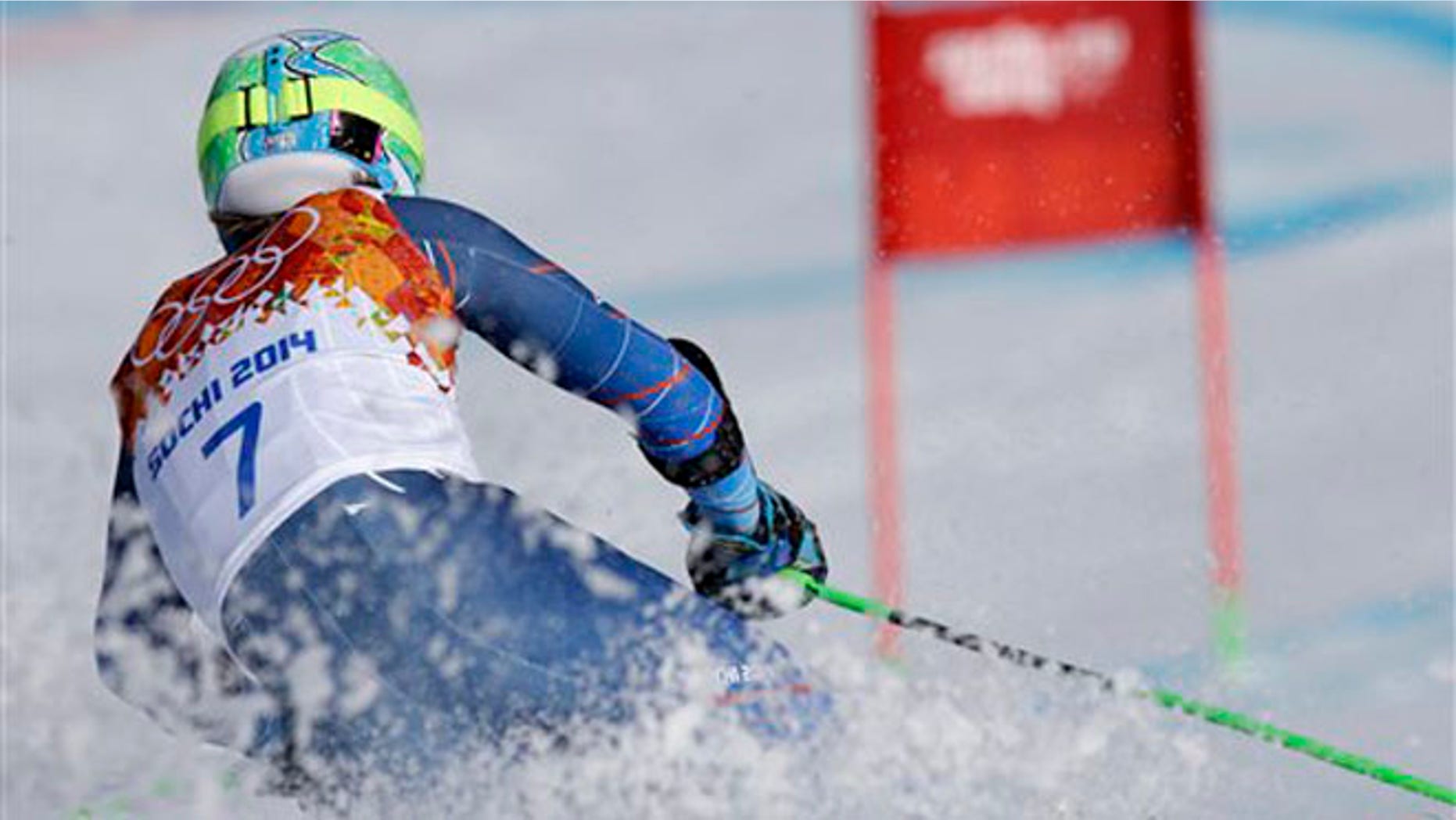 Gold medal winner, United States' Ted Ligety skis in the second run of the men's giant slalom to the Sochi 2014 Winter Olympics, Wednesday, Feb. 19, 2014, in Krasnaya Polyana, Russia.