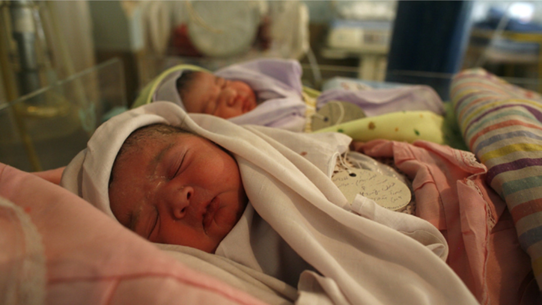 KABUL, AFGHANISTAN - OCTOBER 14: Newborn babies rest inside the Neonatal ward at the Malalai Maternity hospital on October 14, 2007 in Kabul, Afghanistan. According to a UNICEF survey, one in nine Afghan women die during or shortly after pregnancy in Afghanistan, one of the highest rates in the world. At the hospital there are approximately 60 to 100 babies born each day, with many women making long journeys to receive the free medical care. UNICEF states that many pregnant women are deprived of basic health care and only 11 percent of deliveries take place in a healthcare facility. In many cases the conservative Afghan culture places the health of many women at risk. Forty percent of the women in Afghanistan are married before the age of 18 with one third having children before reaching adulthood. (Photo Paula Bronstein/Getty Images)