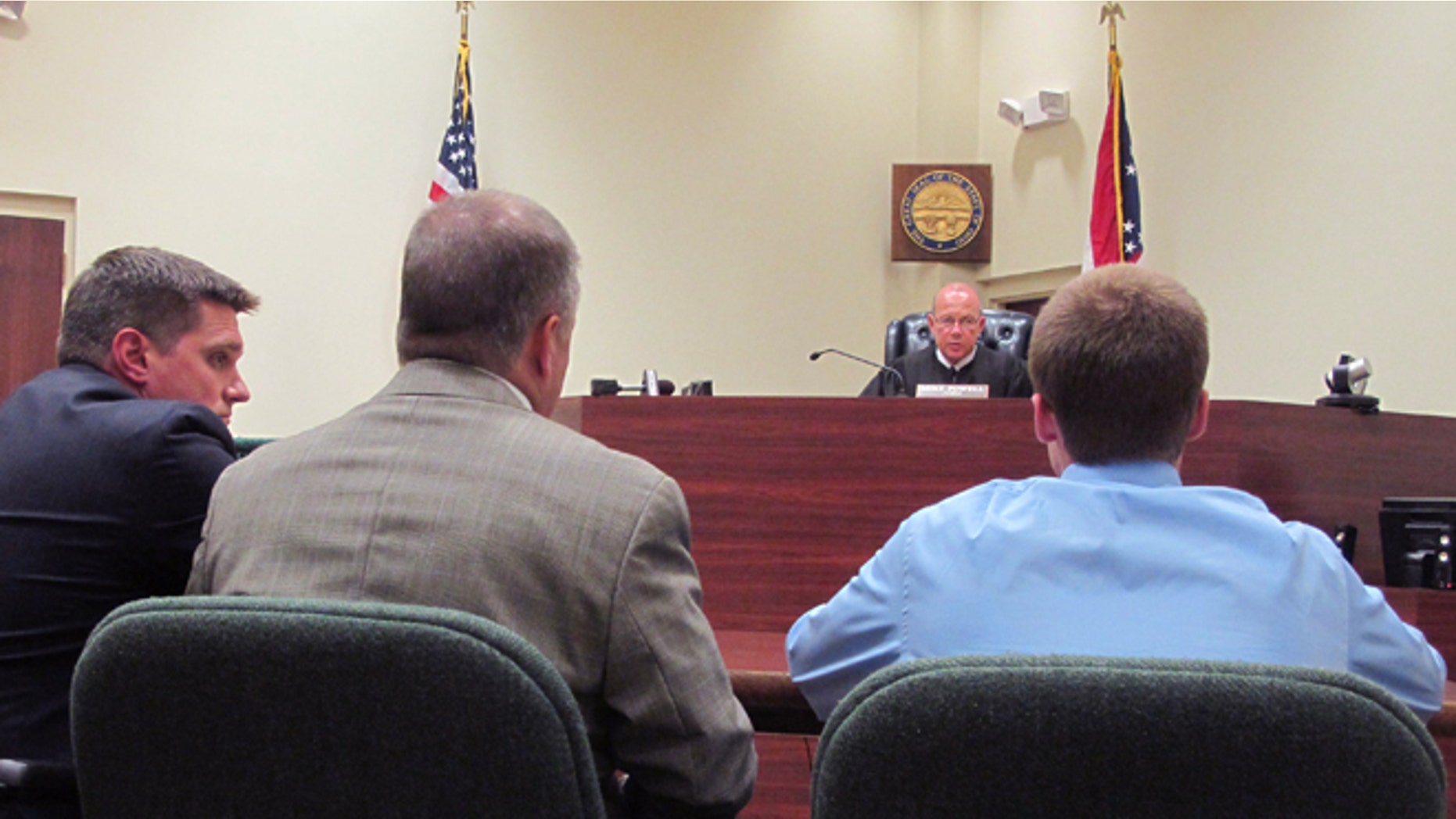 July 31, 2012: In this photo, Warren County Juvenile Court Judge Mike Powell warns 17-year-old Ohio high school student Tyler Pagenstecher, right, of the consequences of admitting guilt at his first hearing in Lebanon, Ohio.