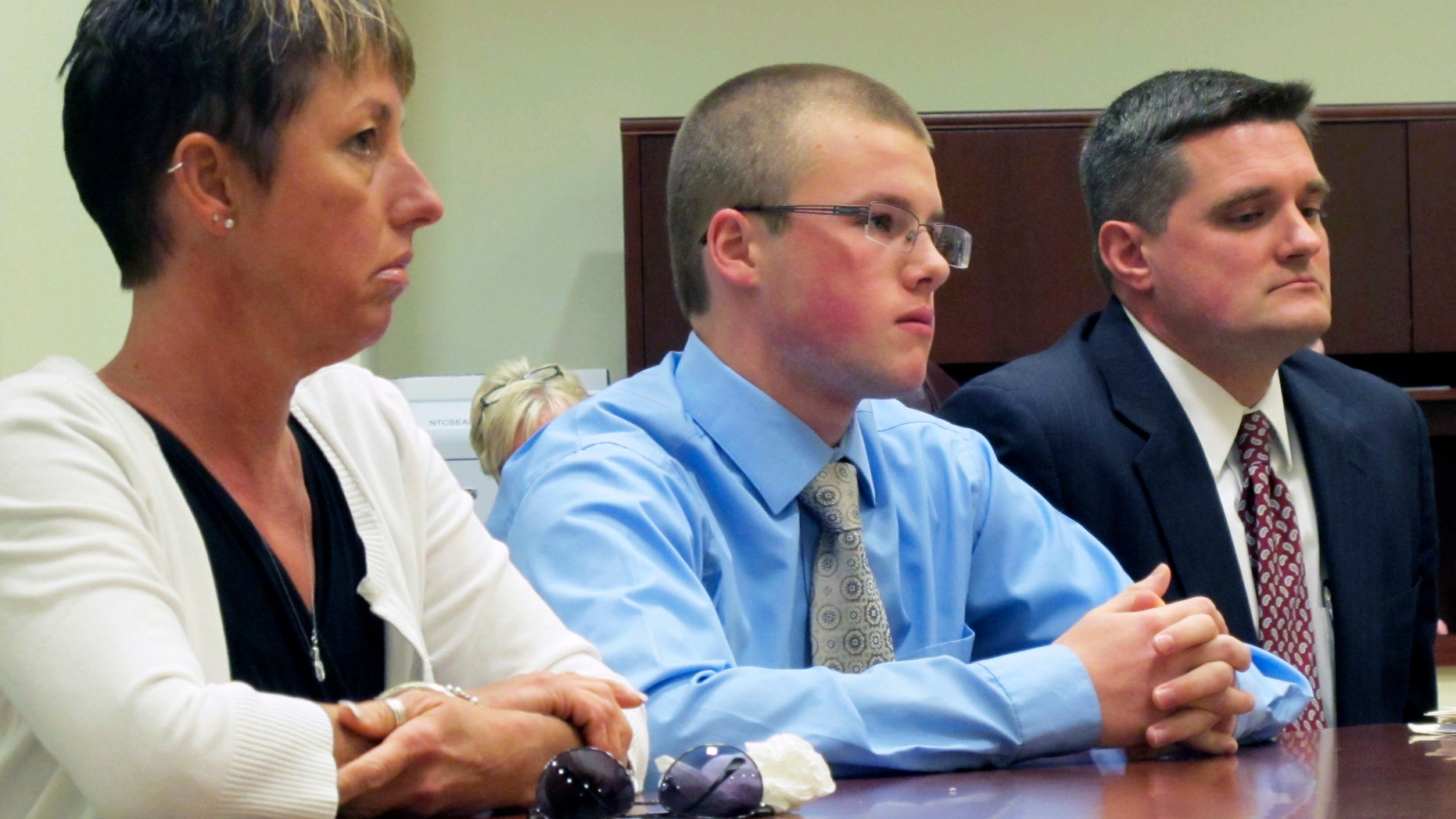 Oct. 22, 2012: Tyler Pagenstecher, 18, center, listens in juvenile court, in Lebanon, Ohio, as a judge sentences him to a minimum of six months in a juvenile jail stemming from his conviction on drug-trafficking charges. Pagenstecher is flanked by his mother, 50-year-old Daffney Pagenstecher, and his attorney, Mike O'Neill.