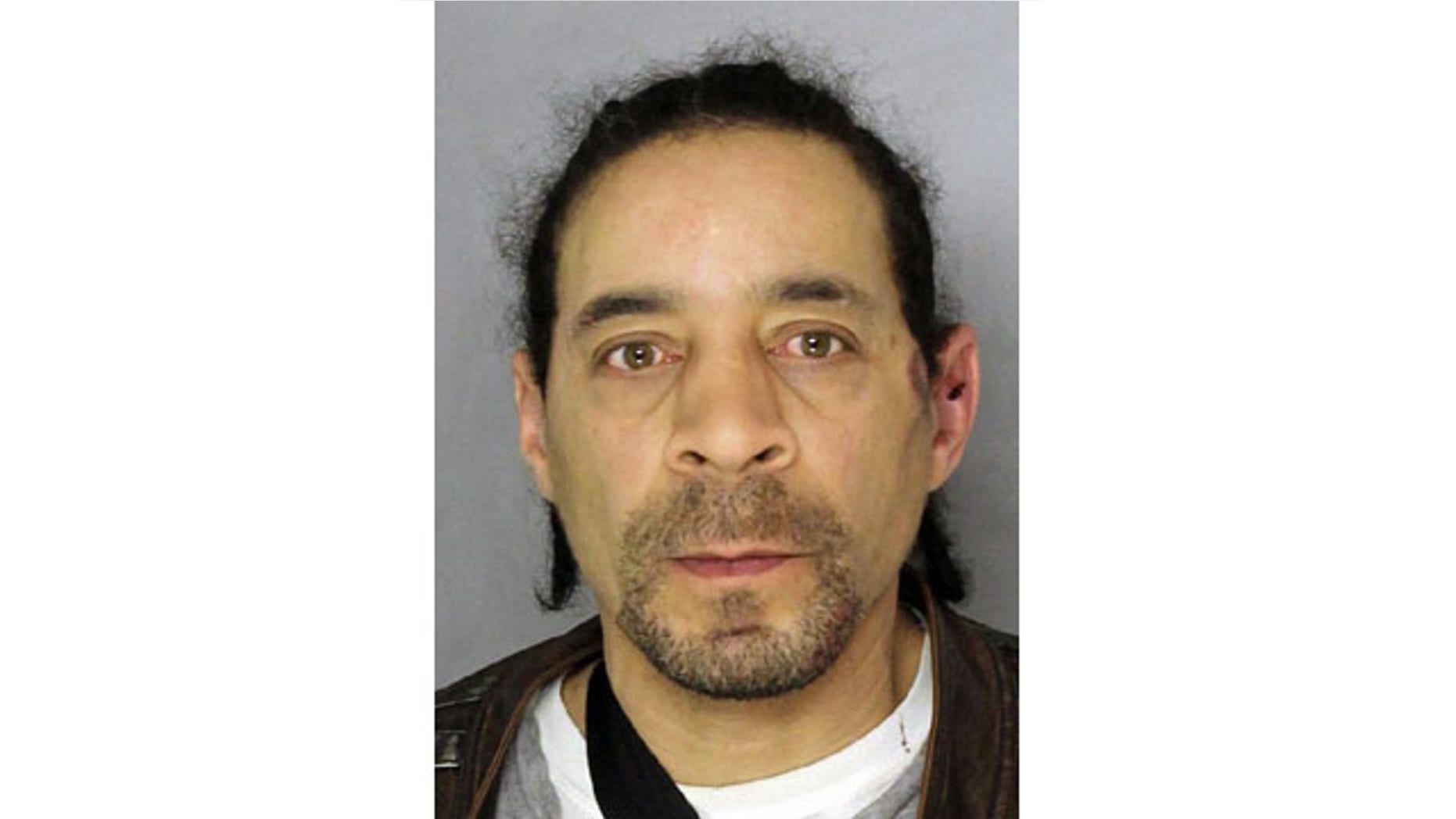 This undated photo provided by the Pittsburgh Police shows Richard Benton. Police charged Benton, 53, with driving under the influence of alcohol after his SUV rolled backward over his daughter and killed her in Stanton Heights on Sunday, Feb. 23, 2014. (AP Photo/Pittsburgh Police via Tribune Review)