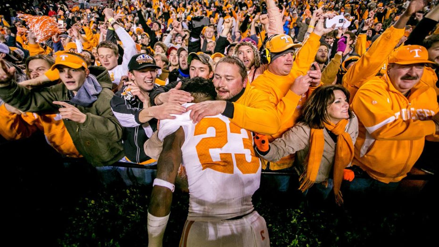 Nov 1, 2014; Columbia, SC, USA; Tennessee Volunteers defensive back Cameron Sutton (23) celebrates with fans following their overtime win over the South Carolina Gamecocks at Williams-Brice Stadium. Mandatory Credit: Jeff Blake-USA TODAY Sports