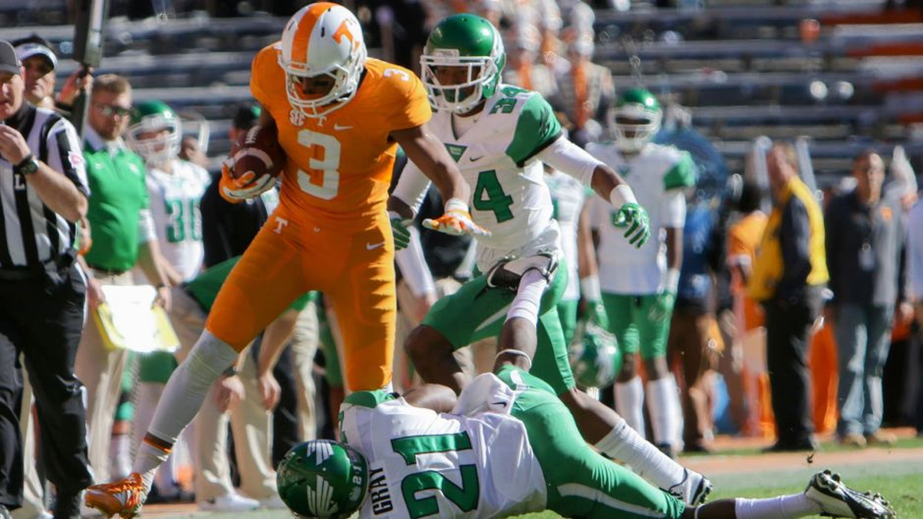 Nov 14, 2015; Knoxville, TN, USA; Tennessee Volunteers wide receiver Josh Malone (3) runs the ball against North Texas Mean Green defensive back James Gray (21) during the first half at Neyland Stadium. Mandatory Credit: Randy Sartin-USA TODAY Sports