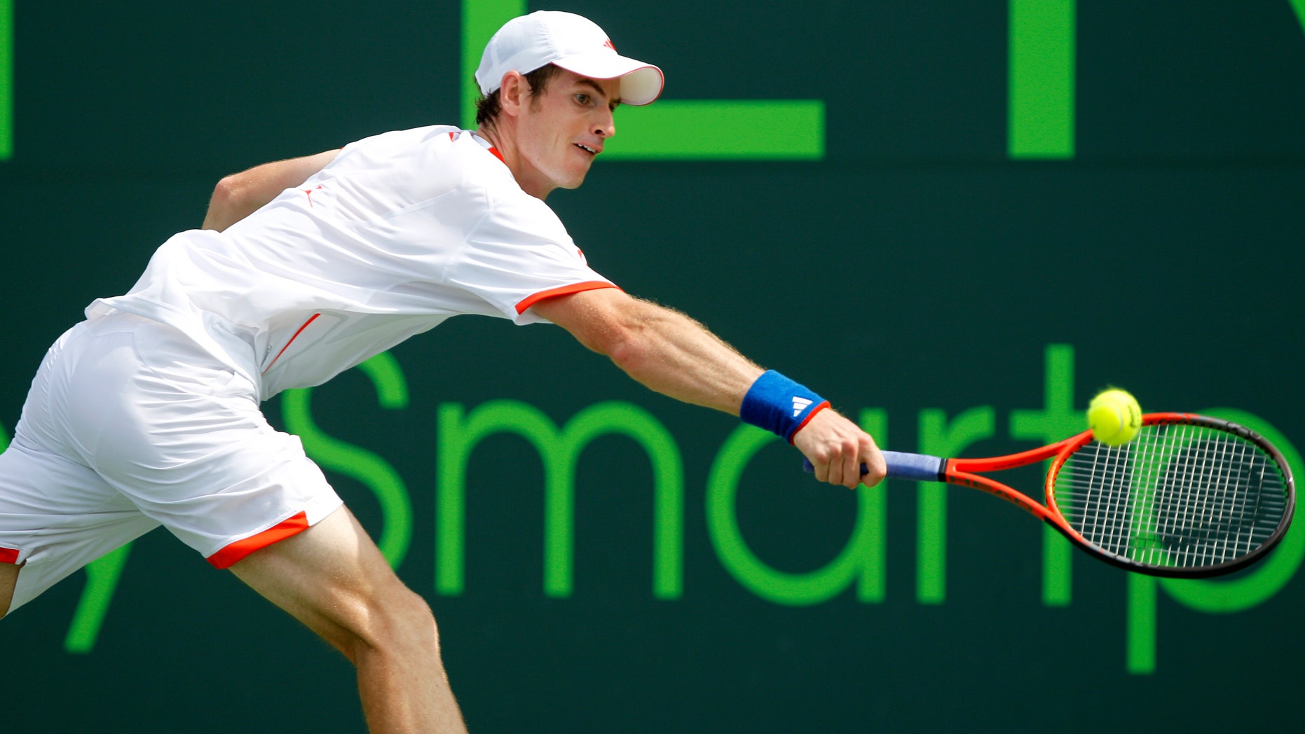 April 1, 2012: This photo shows Andy Murray, of Great Britain, returning the ball to Novak Djokovic, of Serbia, during the men's singles final match at the Sony Ericsson Open tennis tournament, in Key Biscayne, Florida.
