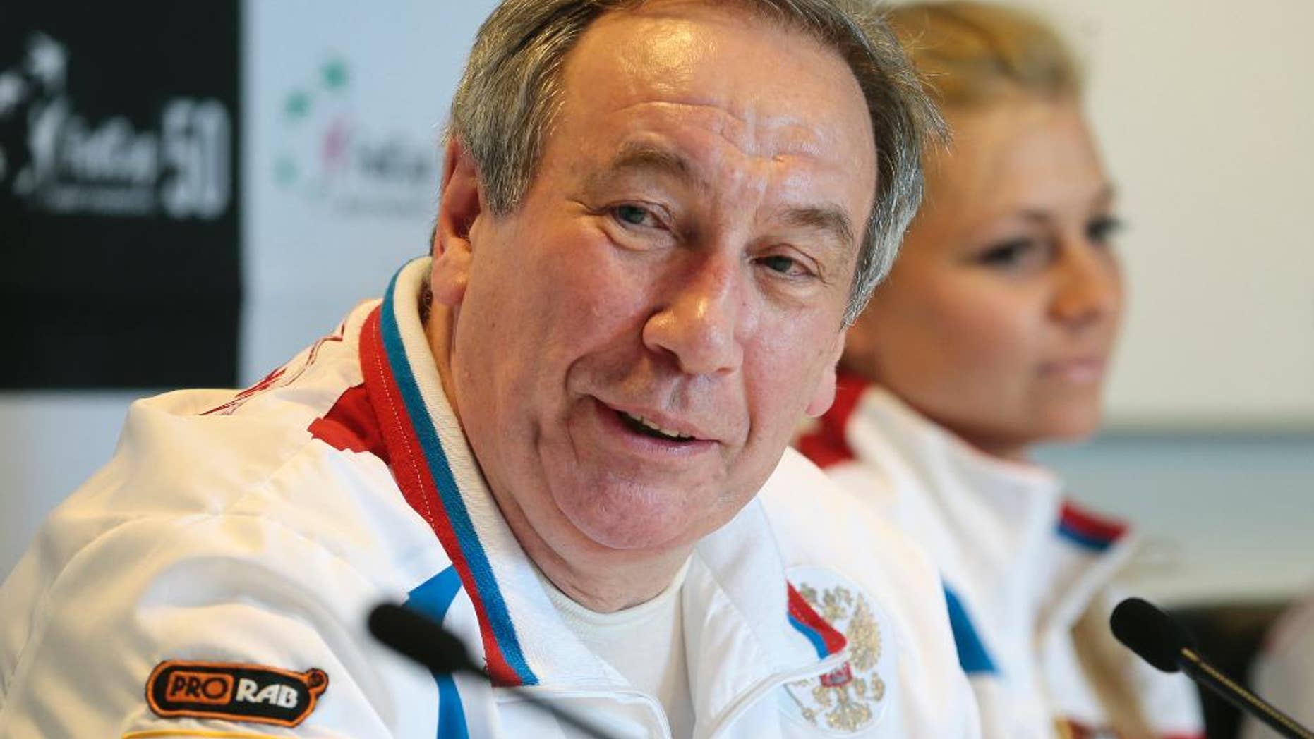 FILE - In this April 16, 2013 file photo, Russia's team captain Shamil Tarpischev speaks during a news conference prior to the Fed Cup match between Russia and Slovakia in Moscow, Russia. Russian Tennis Federation President Tarpischev has been fined $25,000 by the WTA Tour and suspended from tour involvement for a year for questioning Venus and Serena Williams' gender in comments on Russian television. The WTA Tour said Friday, Oct. 17, 2014, that the $25,000 fine is the maximum allowed under tour rules and that it is seeking Tarpischev's removal as chairman of the Kremlin Cup tournament for one year. (AP Photo/Mikhail Metzel, File)