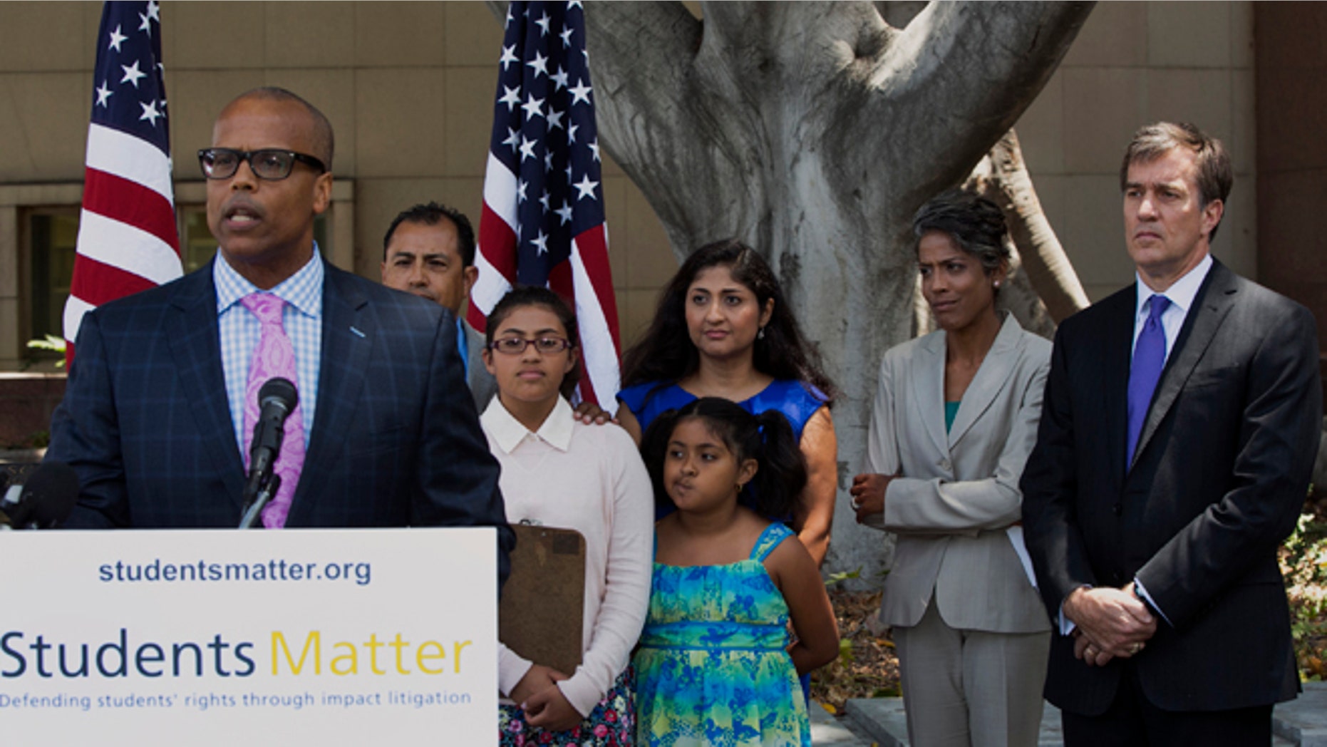 Tuesday, June 10, 2014: A judge struck down tenure and other job protections for California's public school teachers as unconstitutional Tuesday, saying such laws harm students.The lawsuit was backed by wealthy Silicon Valley entrepreneur David Welch (far right) which assembled a high-profile legal team.