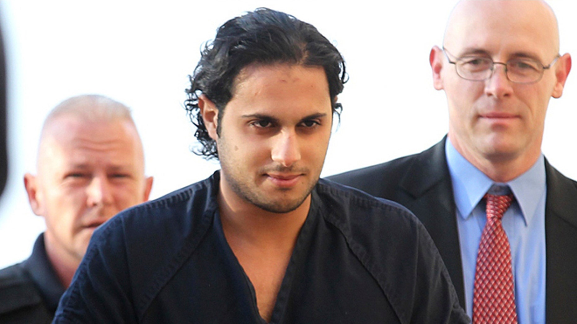 Feb. 25, 2011: In this file photo, Khalid Ali-M Aldawsari, accused of buying chemicals and equipment to build a weapon of mass destruction, is escorted to a court appearance in Lubbock, Texas.