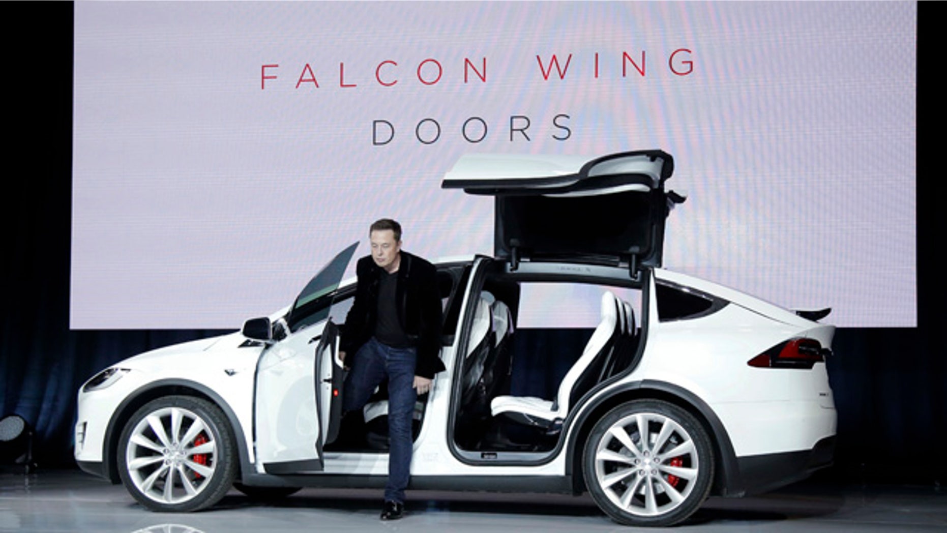 Sept. 29, 2015: Elon Musk, CEO of Tesla Motors Inc., introduces the Model X car at the company's headquarters in Fremont, Calif. (AP Photo/Marcio Jose Sanchez)