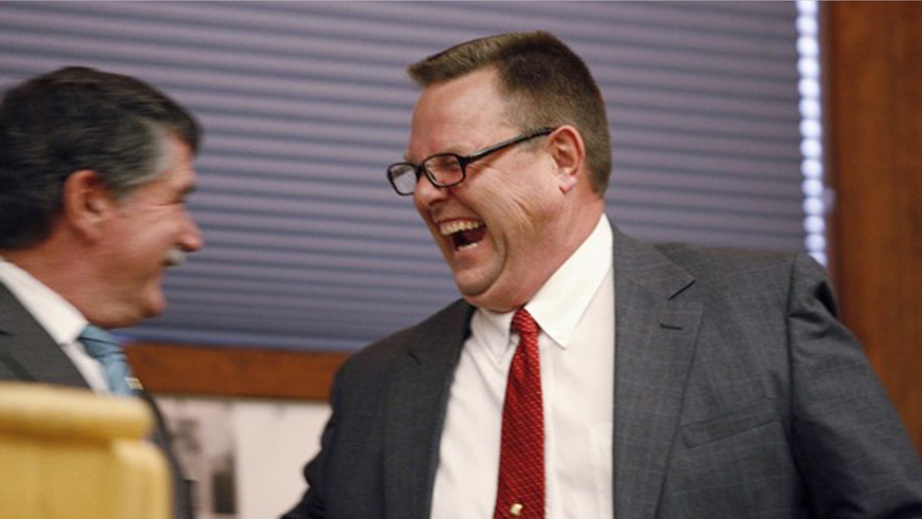 FILE: June 10, 2012: Sen. Jon Tester, D-Mont., laughs with Rep. Denny Rehberg, R-Mont., before the first debate of the 2012 election in Big Sky, Mont.