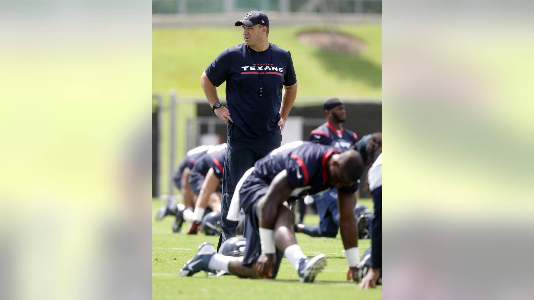 FILE - In this June 17, 2014, file photo, Houston Texans head coach Bill O'Brien walks through practice during NFL football minicamp in Houston. (AP Photo/Patric Schneider, File)