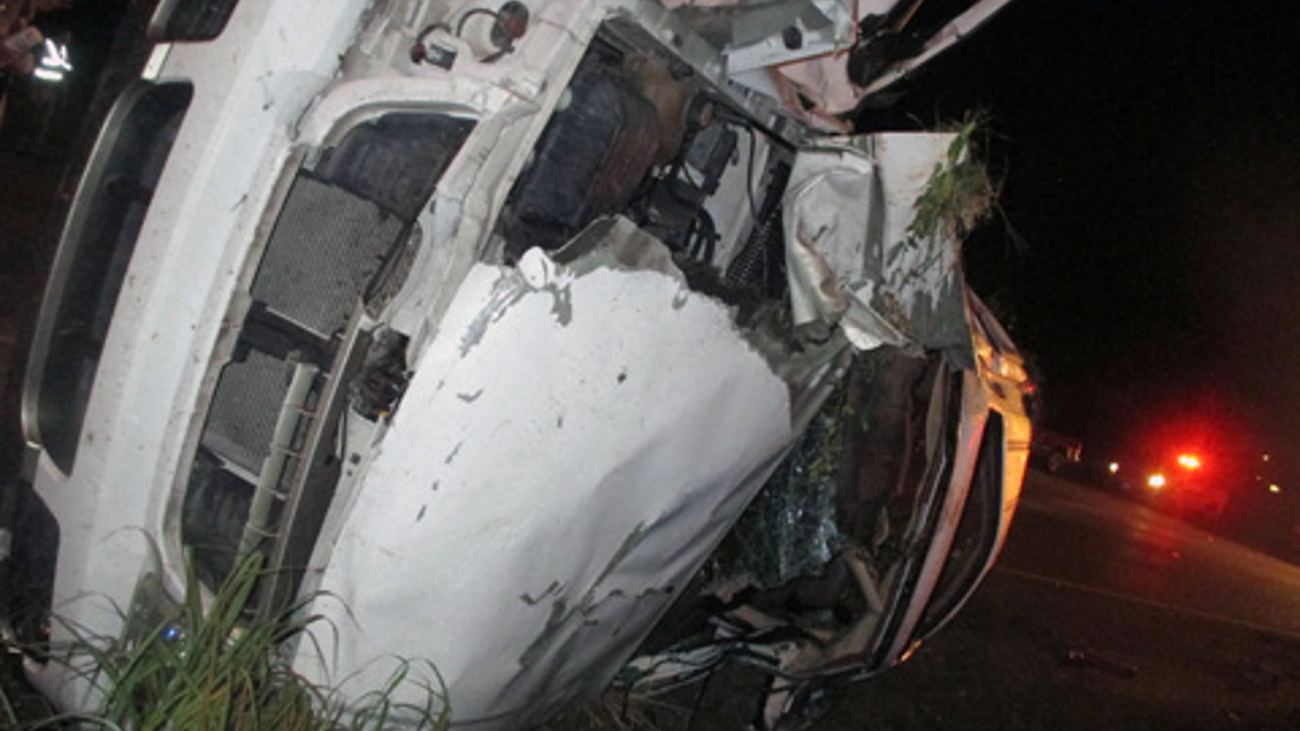 Sept. 24, 2015: In this photo provided by the Edna (Texas) Police Department, an SUV that flipped several times remains on the scene following a fatal crash and police chase. Officers tried to stop the SUV for a traffic violation but the vehicle sped away and police gave chase. (Edna Police Department via AP)