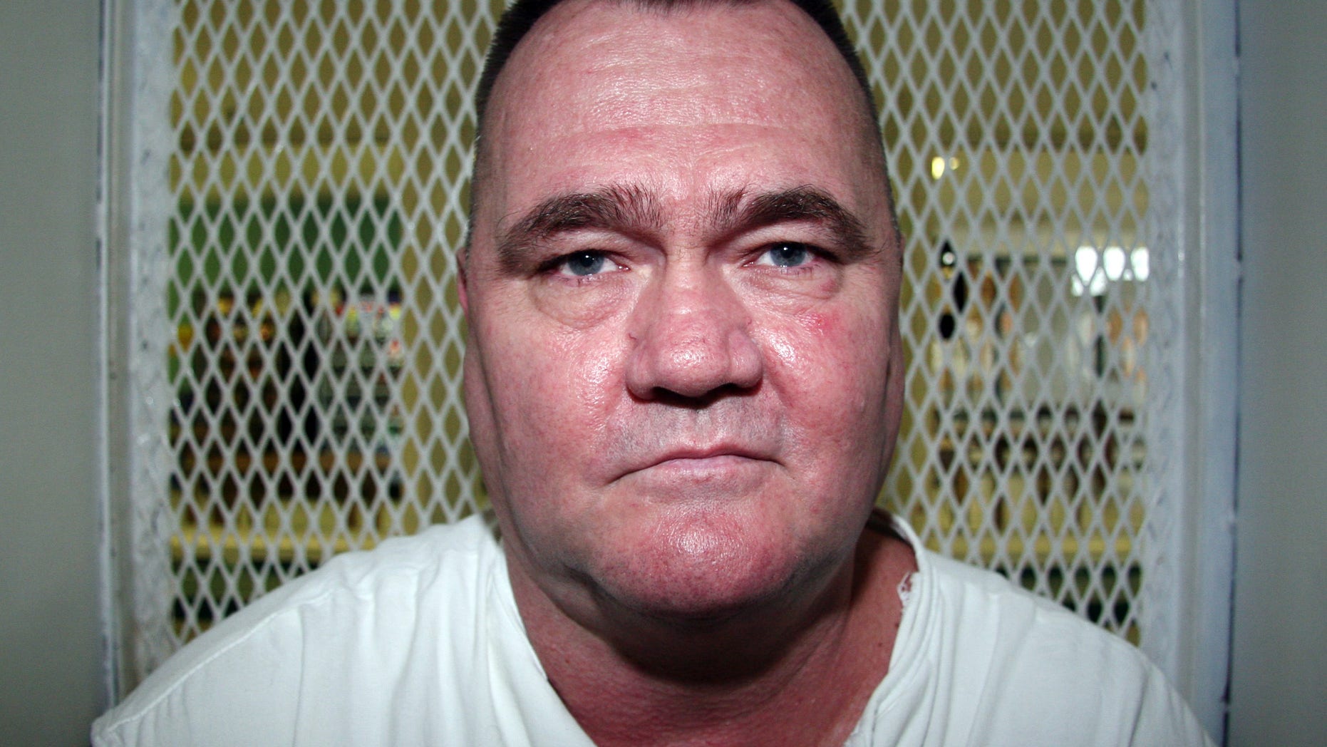 Aug. 29, 2012: In this photo, convicted killer Cleve Foster speaks from a visiting cage at the Texas Department of Criminal Justice Polunsky Unit outside Livingston, Texas.